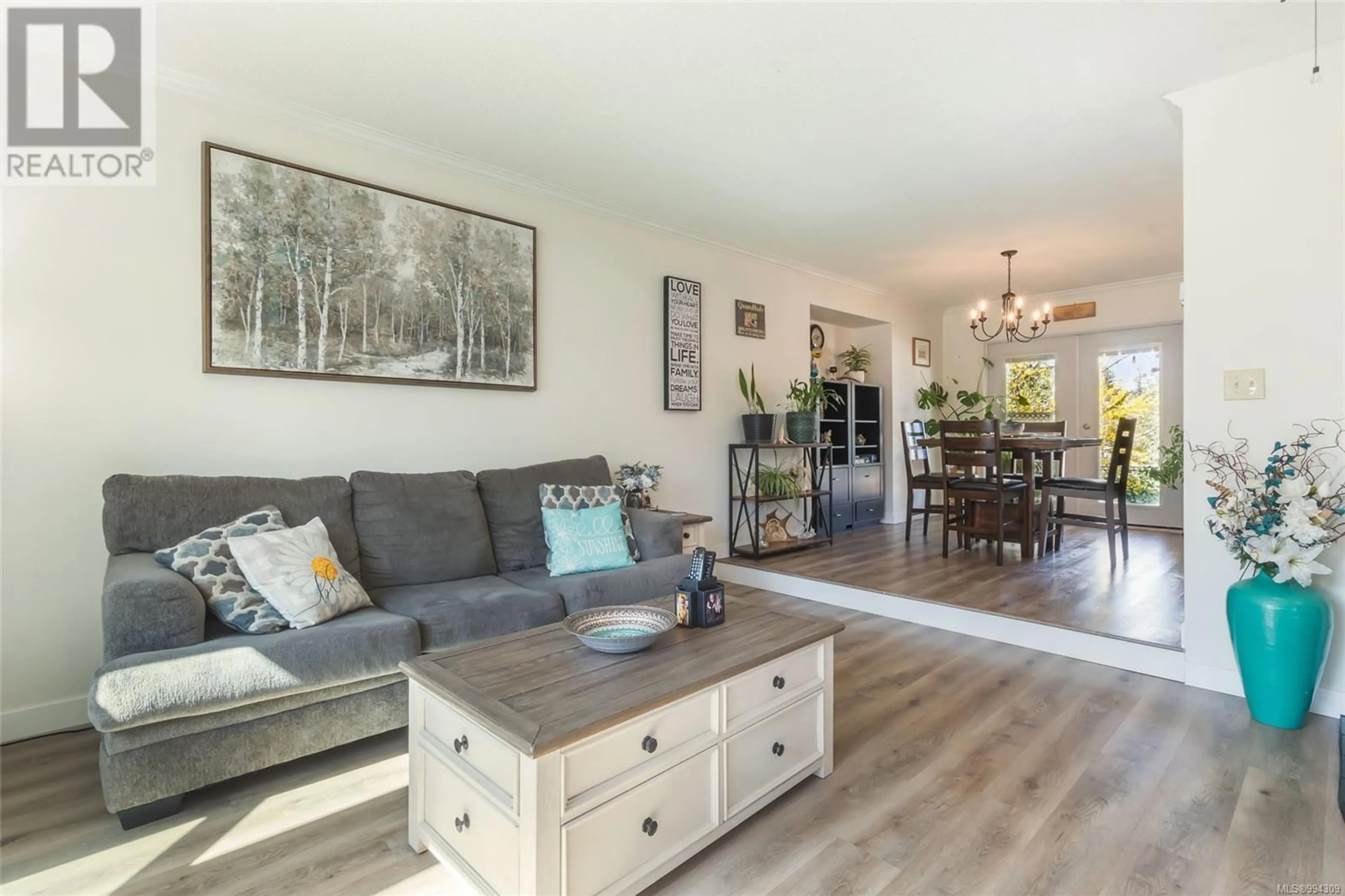 Living room with furniture, wood/laminate floor for 4505 WOODWINDS CRESCENT, Nanaimo British Columbia V9T4R3