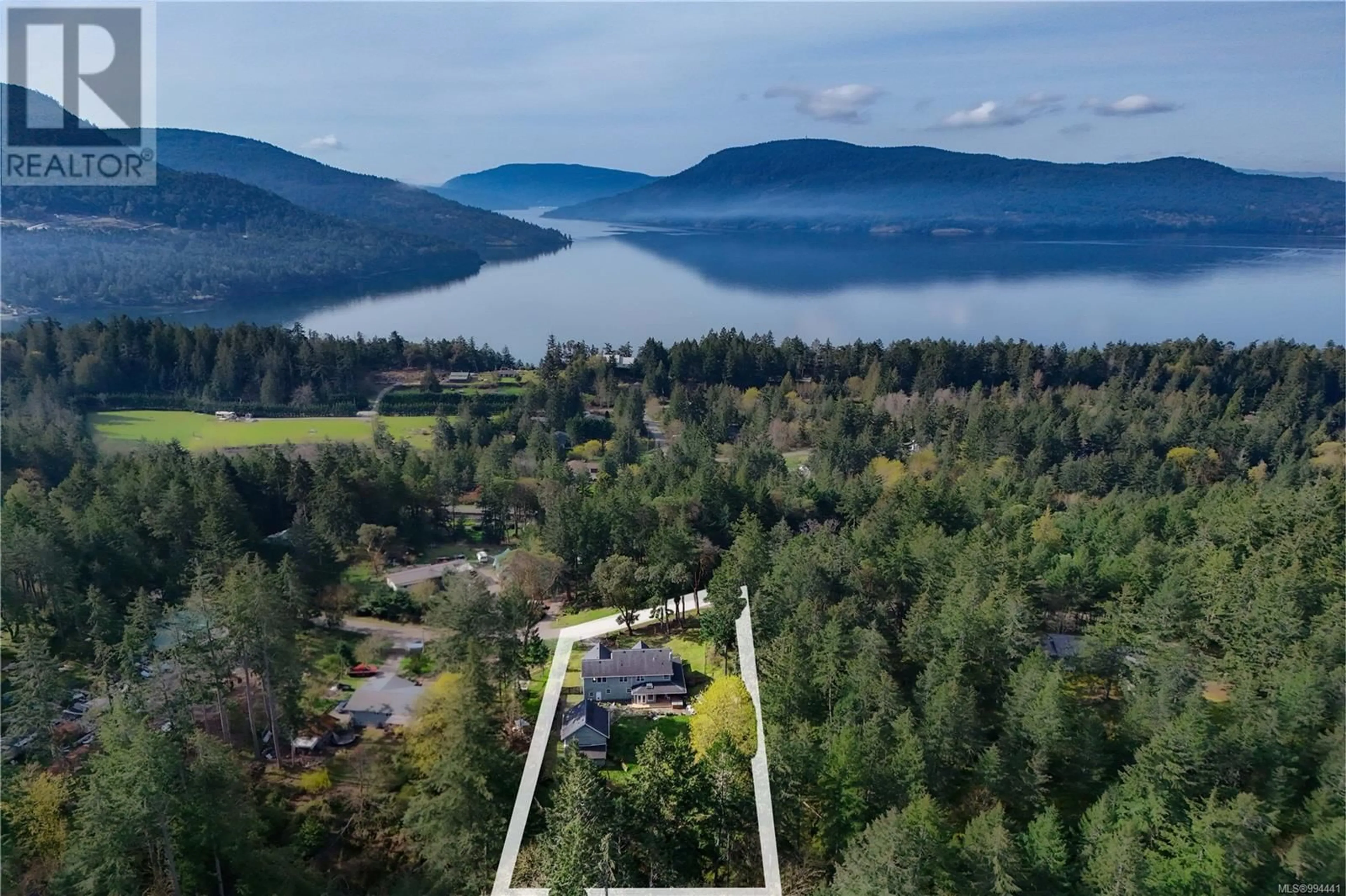 A pic from outside/outdoor area/front of a property/back of a property/a pic from drone, water/lake/river/ocean view for 340 WOODLAND DRIVE, Salt Spring British Columbia V8K1J6