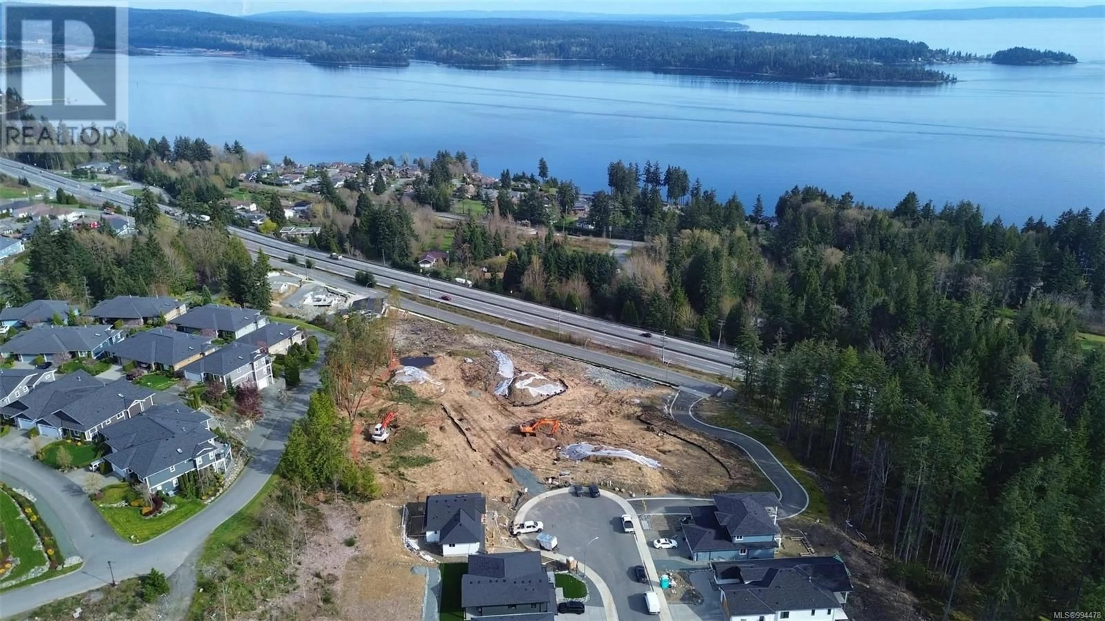 A pic from outside/outdoor area/front of a property/back of a property/a pic from drone, water/lake/river/ocean view for 702 STRINGER WAY, Ladysmith British Columbia V9G0A7