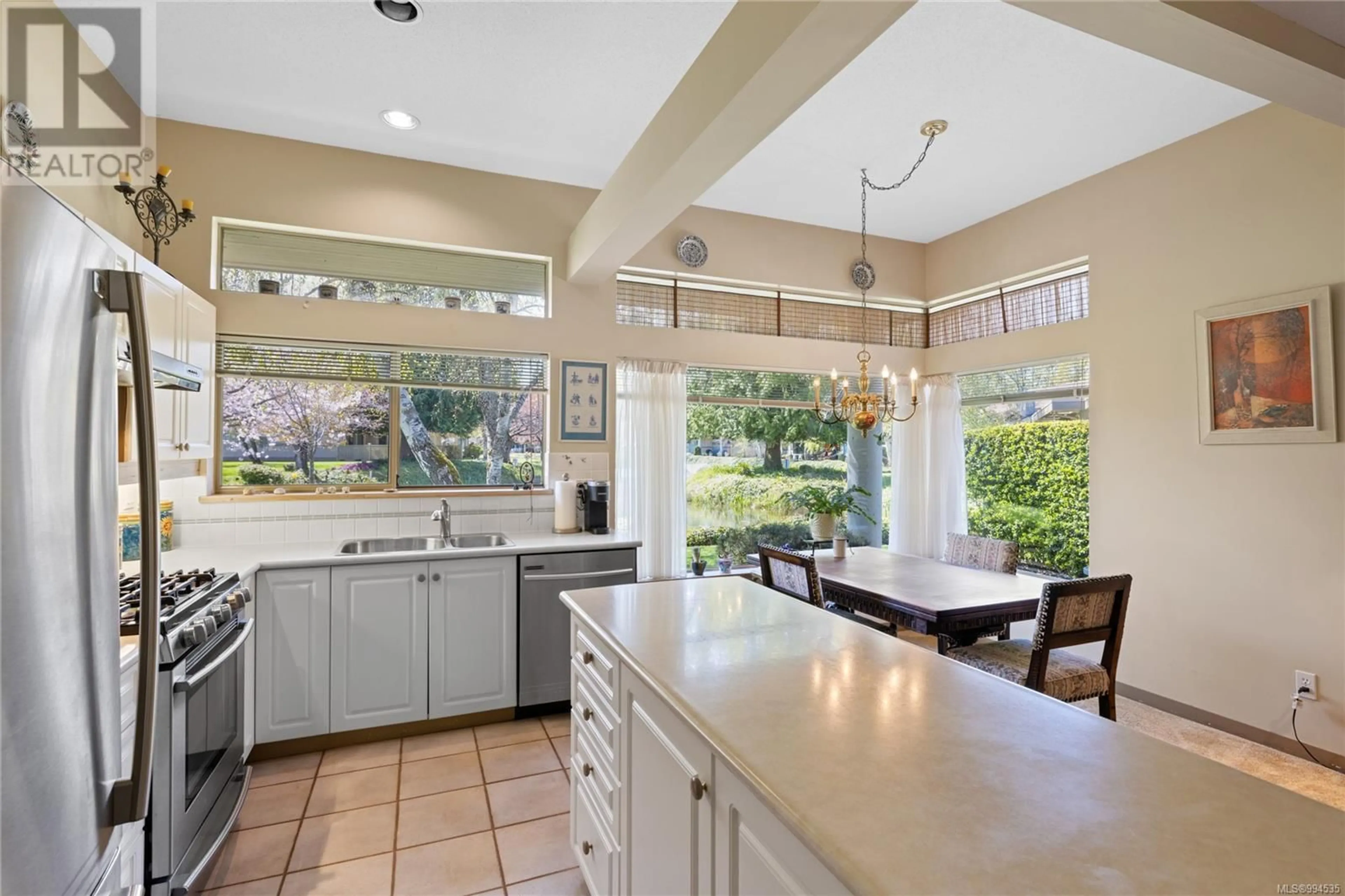 Open concept kitchen, ceramic/tile floor for 1220 POND PLACE, French Creek British Columbia V9P2P8