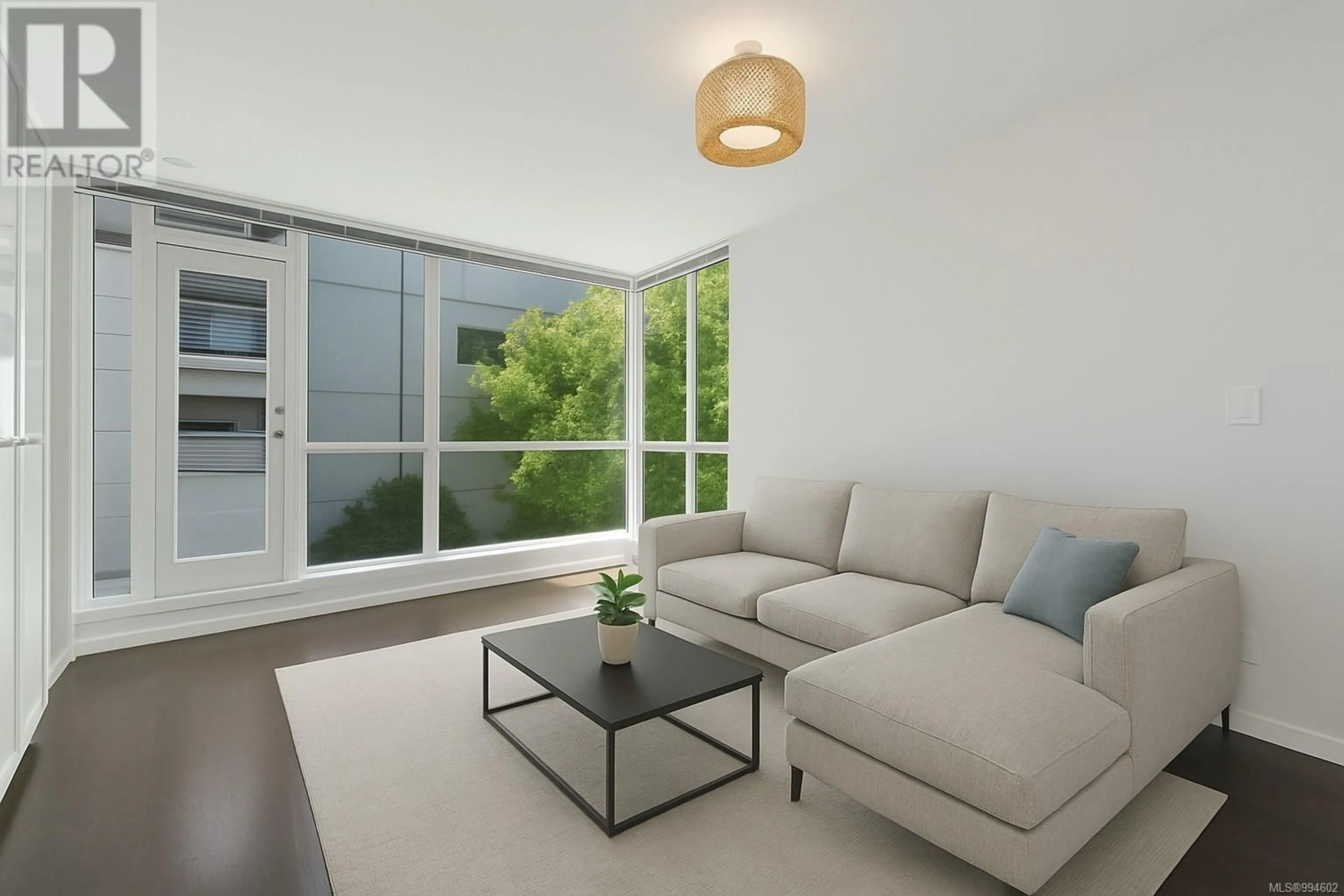 Living room with furniture, unknown for 301 - 732 CORMORANT STREET, Victoria British Columbia V8W4A5