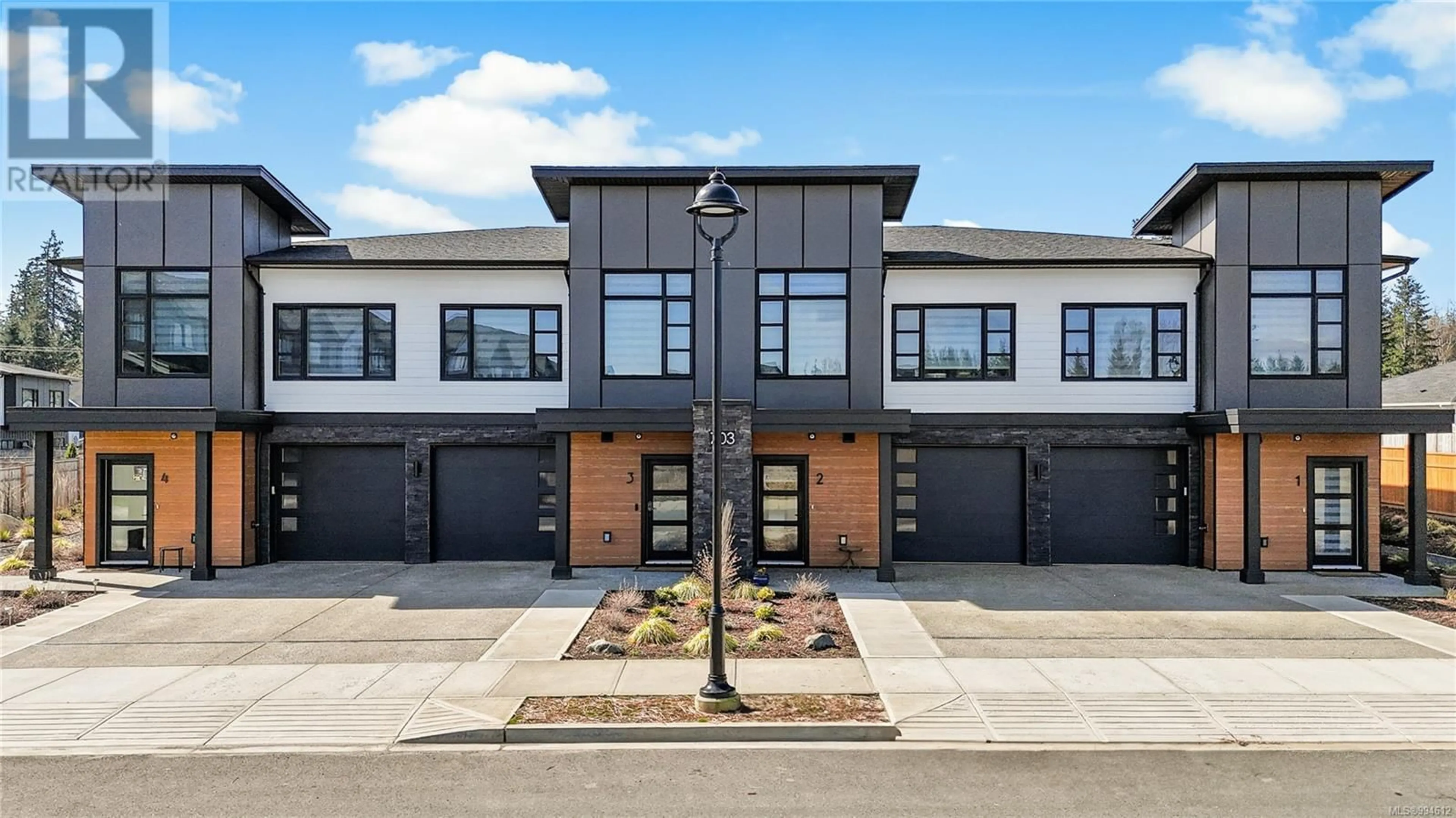 Home with brick exterior material, street for 2 - 703 BEAVER CREEK BOULEVARD, Campbell River British Columbia V9H0E9