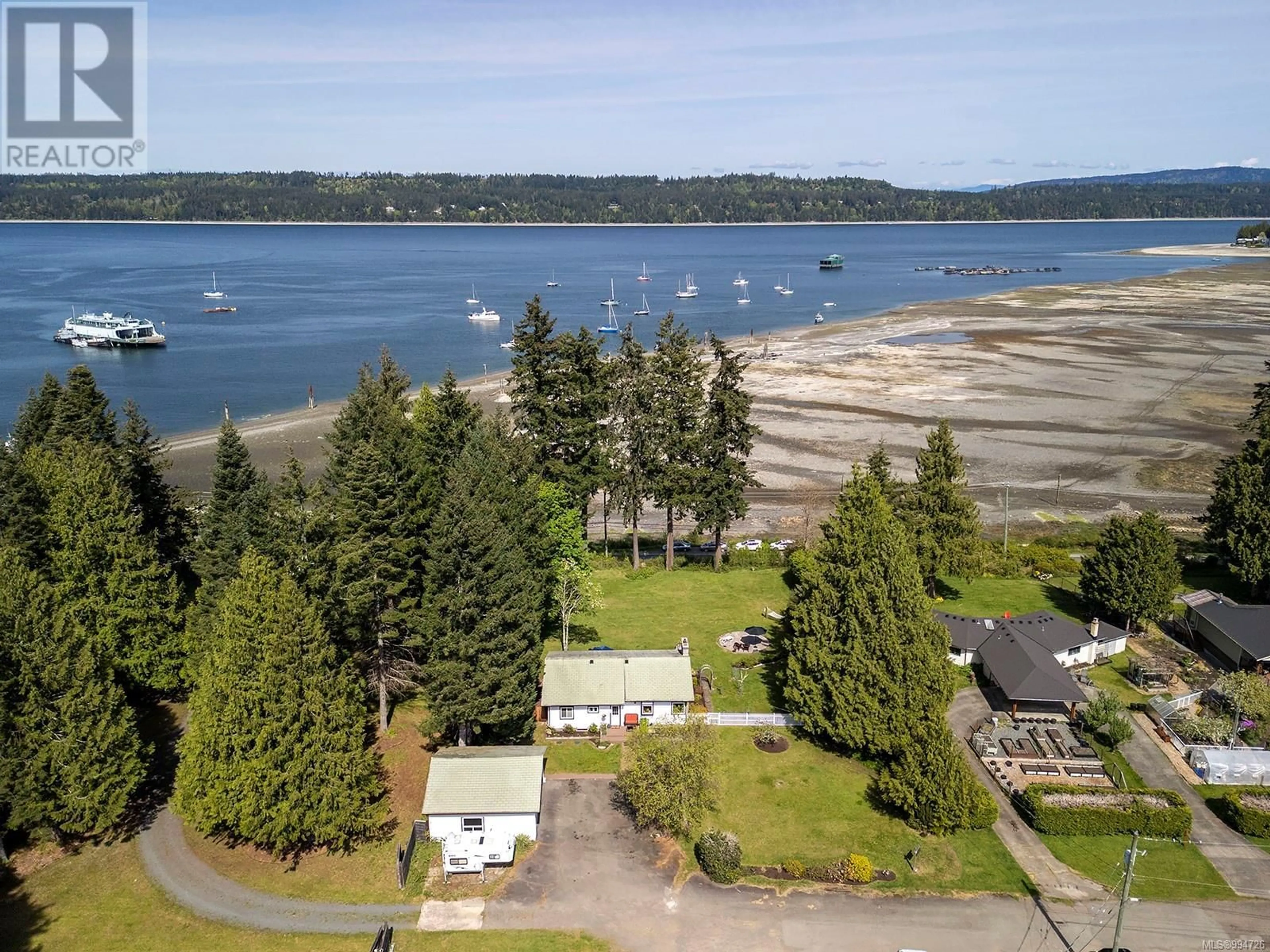A pic from outside/outdoor area/front of a property/back of a property/a pic from drone, water/lake/river/ocean view for 7410 YAKE ROAD, Fanny Bay British Columbia V0R1W0