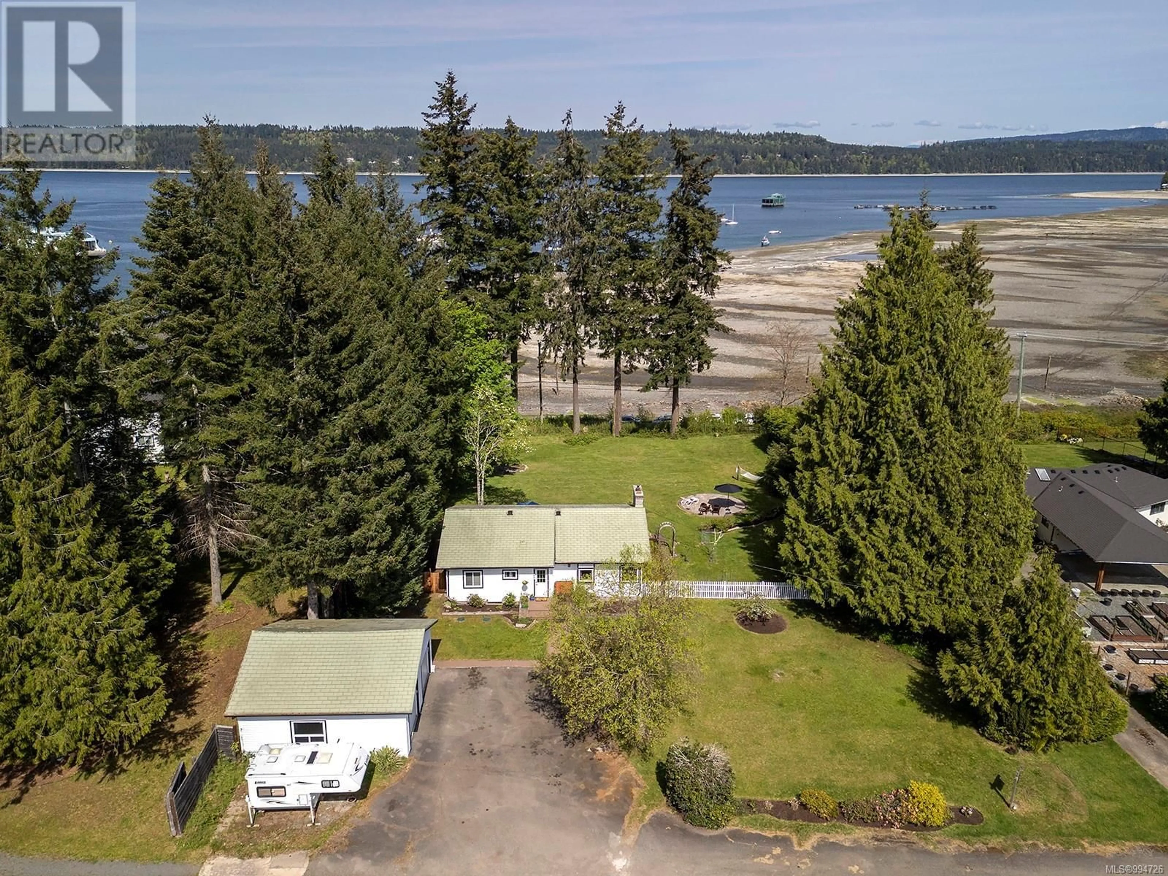 A pic from outside/outdoor area/front of a property/back of a property/a pic from drone, water/lake/river/ocean view for 7410 YAKE ROAD, Fanny Bay British Columbia V0R1W0