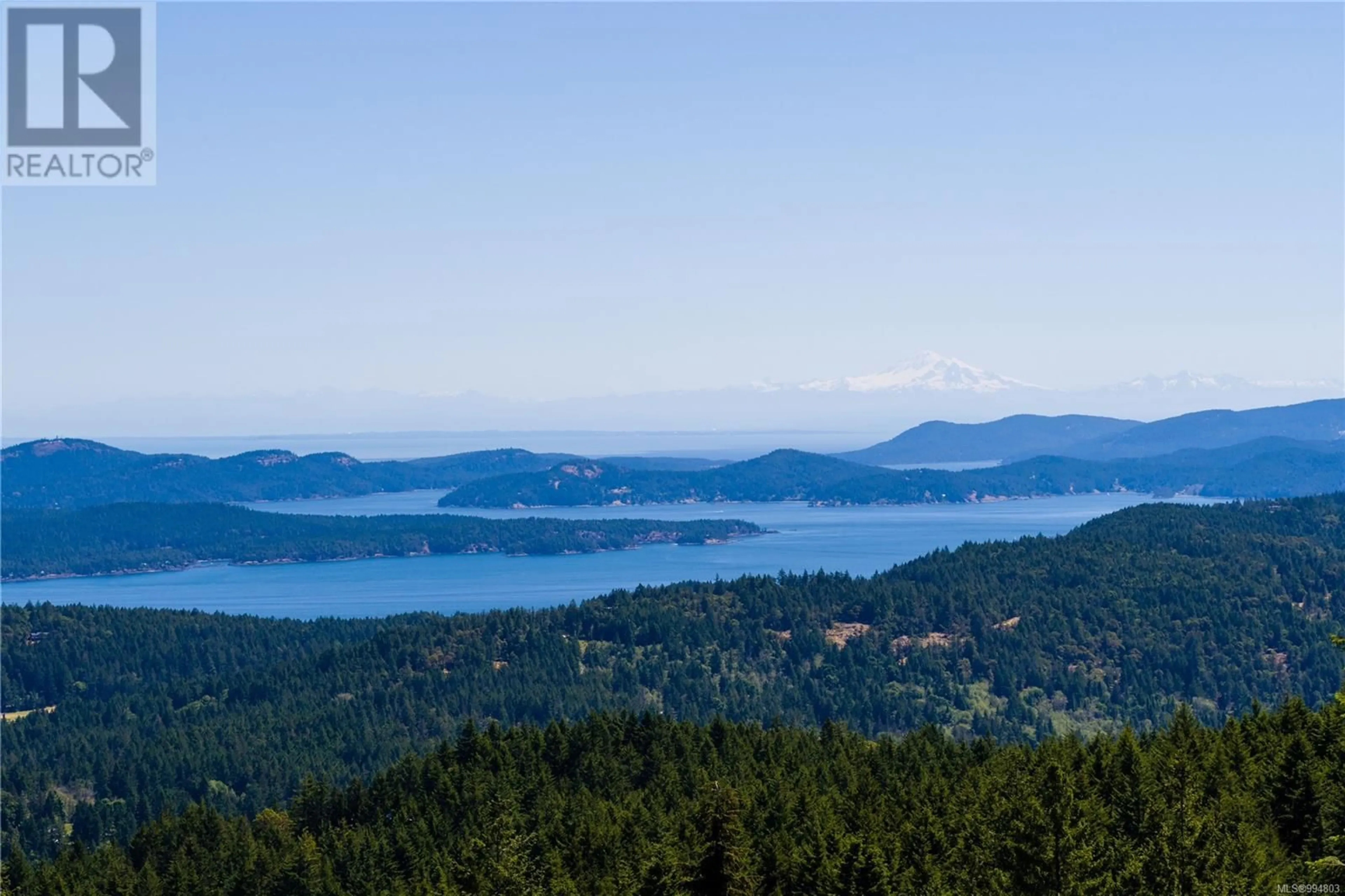 A pic from outside/outdoor area/front of a property/back of a property/a pic from drone, water/lake/river/ocean view for 377 SEYMOUR HEIGHTS, Salt Spring British Columbia V8K2B6
