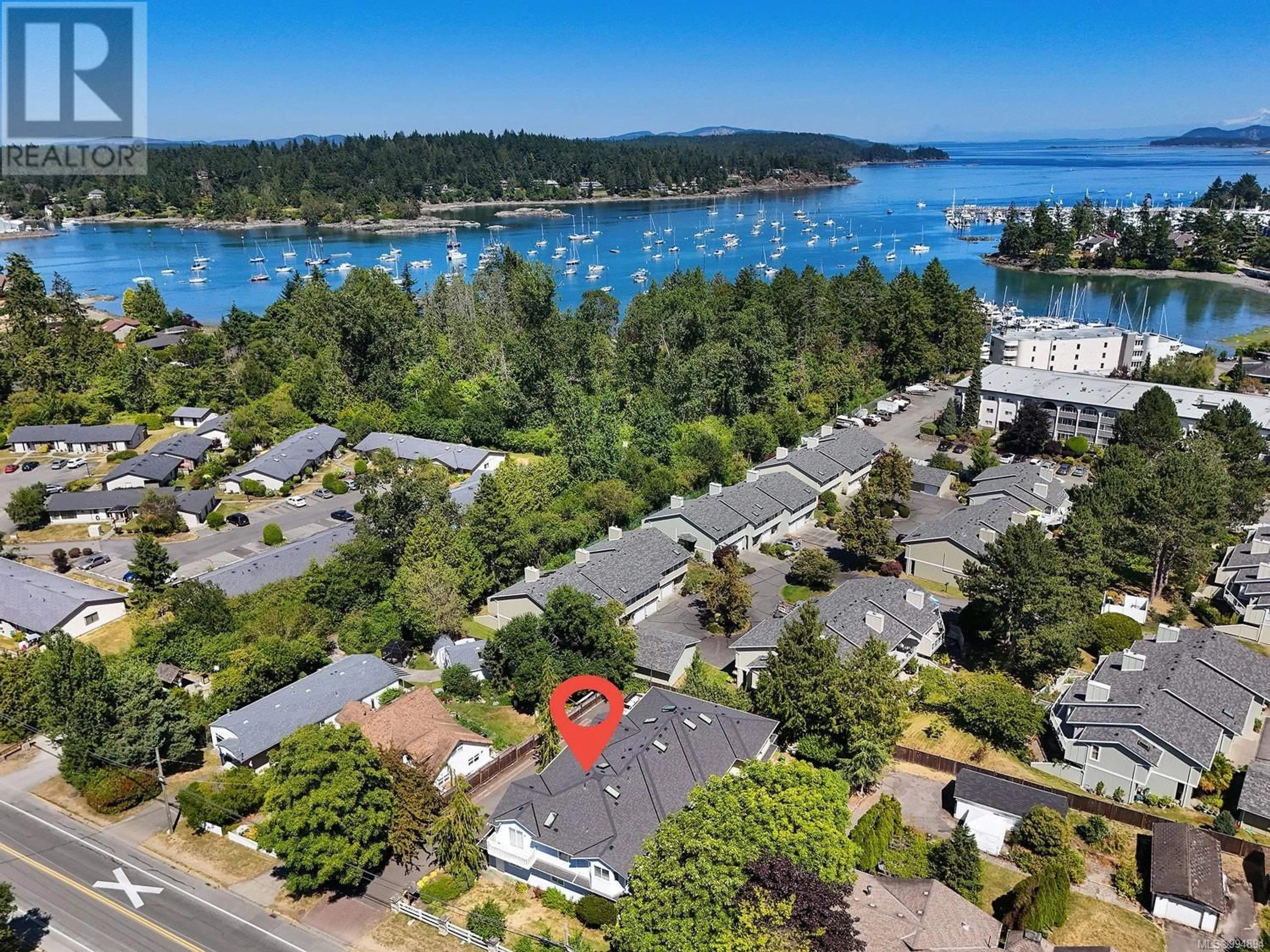 A pic from outside/outdoor area/front of a property/back of a property/a pic from drone, water/lake/river/ocean view for 2 - 10549 MCDONALD PARK ROAD, Sidney British Columbia V8L3J2