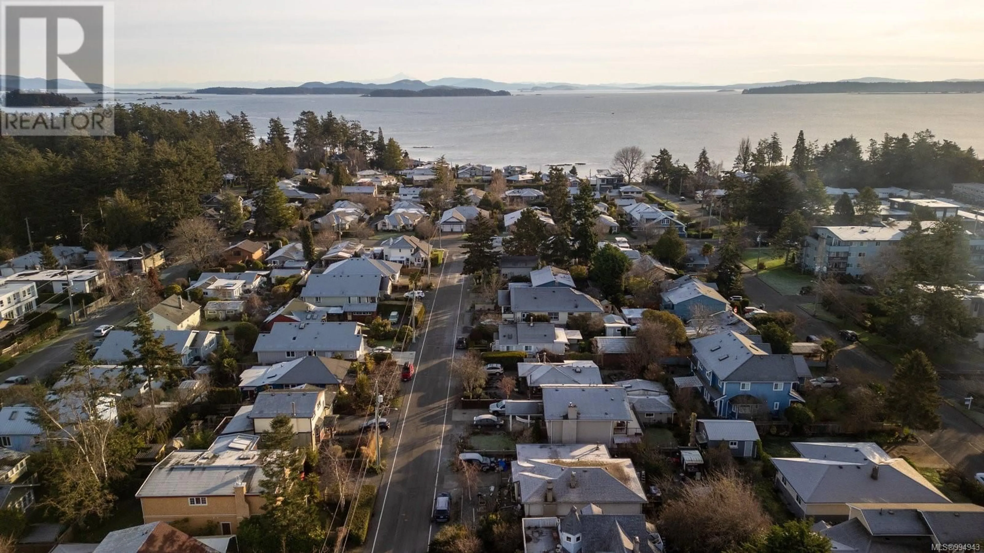 A pic from outside/outdoor area/front of a property/back of a property/a pic from drone, water/lake/river/ocean view for 2425 AMELIA AVENUE, Sidney British Columbia V8L2J4