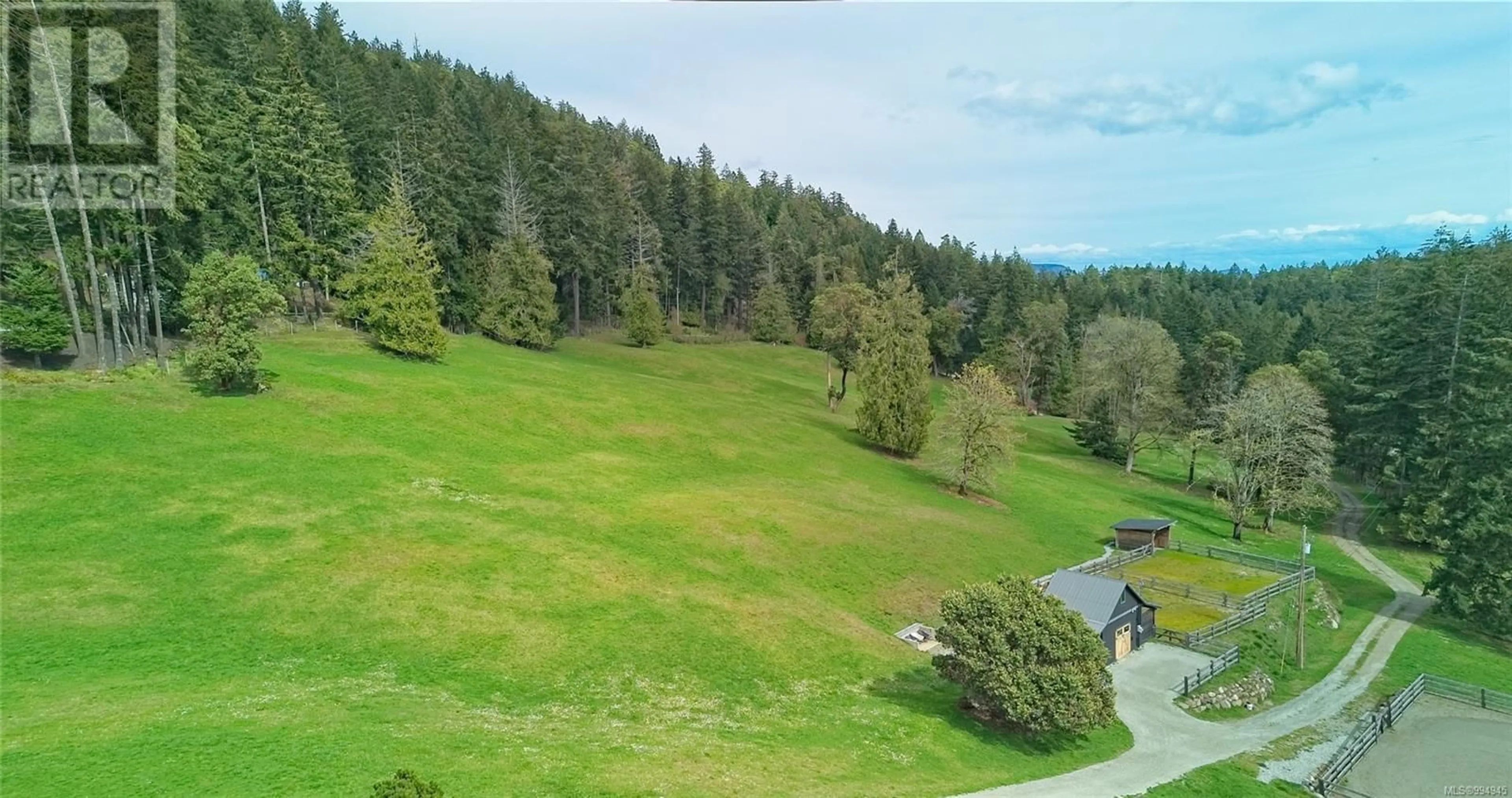 A pic from outside/outdoor area/front of a property/back of a property/a pic from drone, forest/trees view for 445 CRANBERRY ROAD, Salt Spring British Columbia V8K2H2
