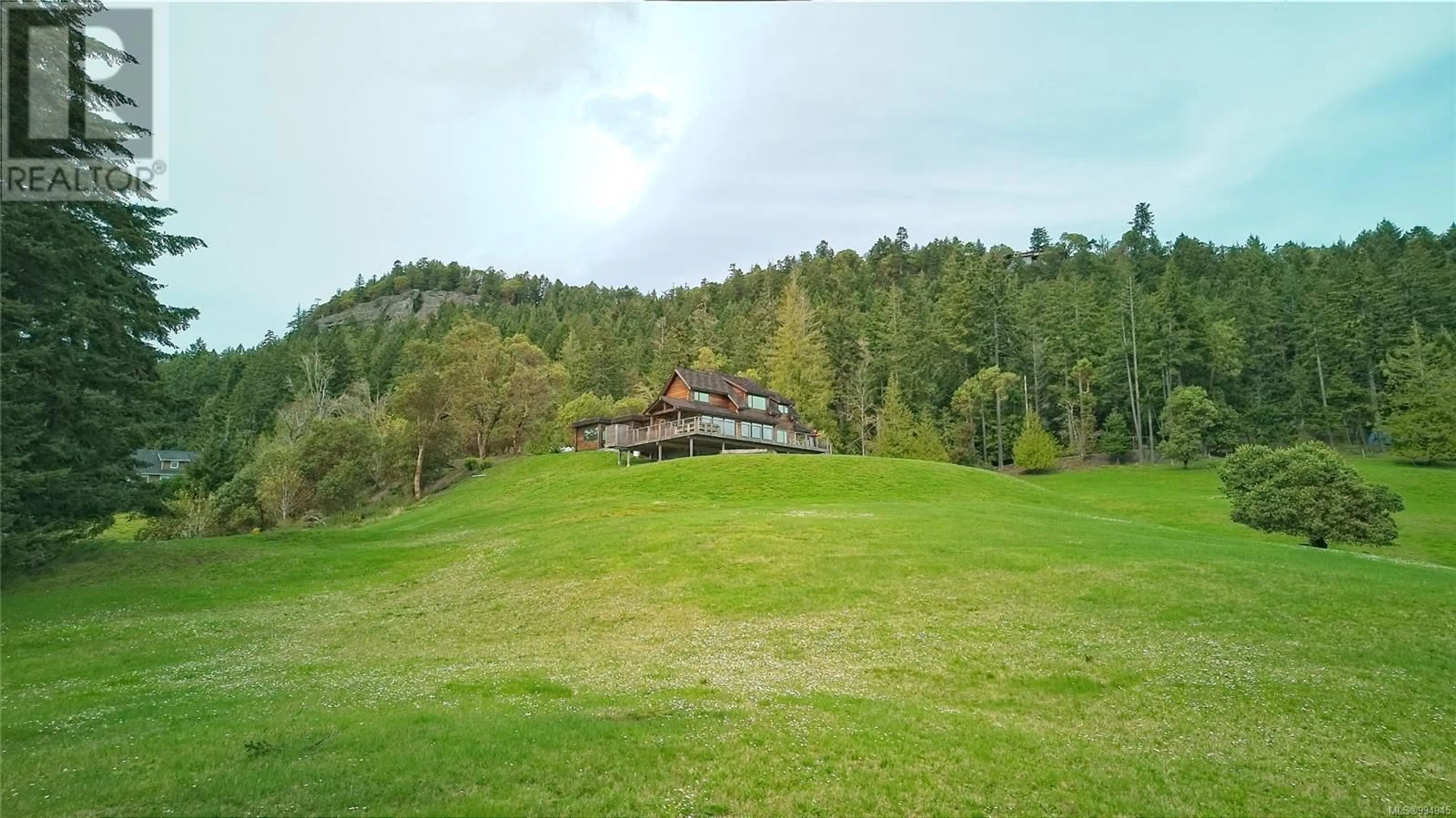 A pic from outside/outdoor area/front of a property/back of a property/a pic from drone, forest/trees view for 445 CRANBERRY ROAD, Salt Spring British Columbia V8K2H2