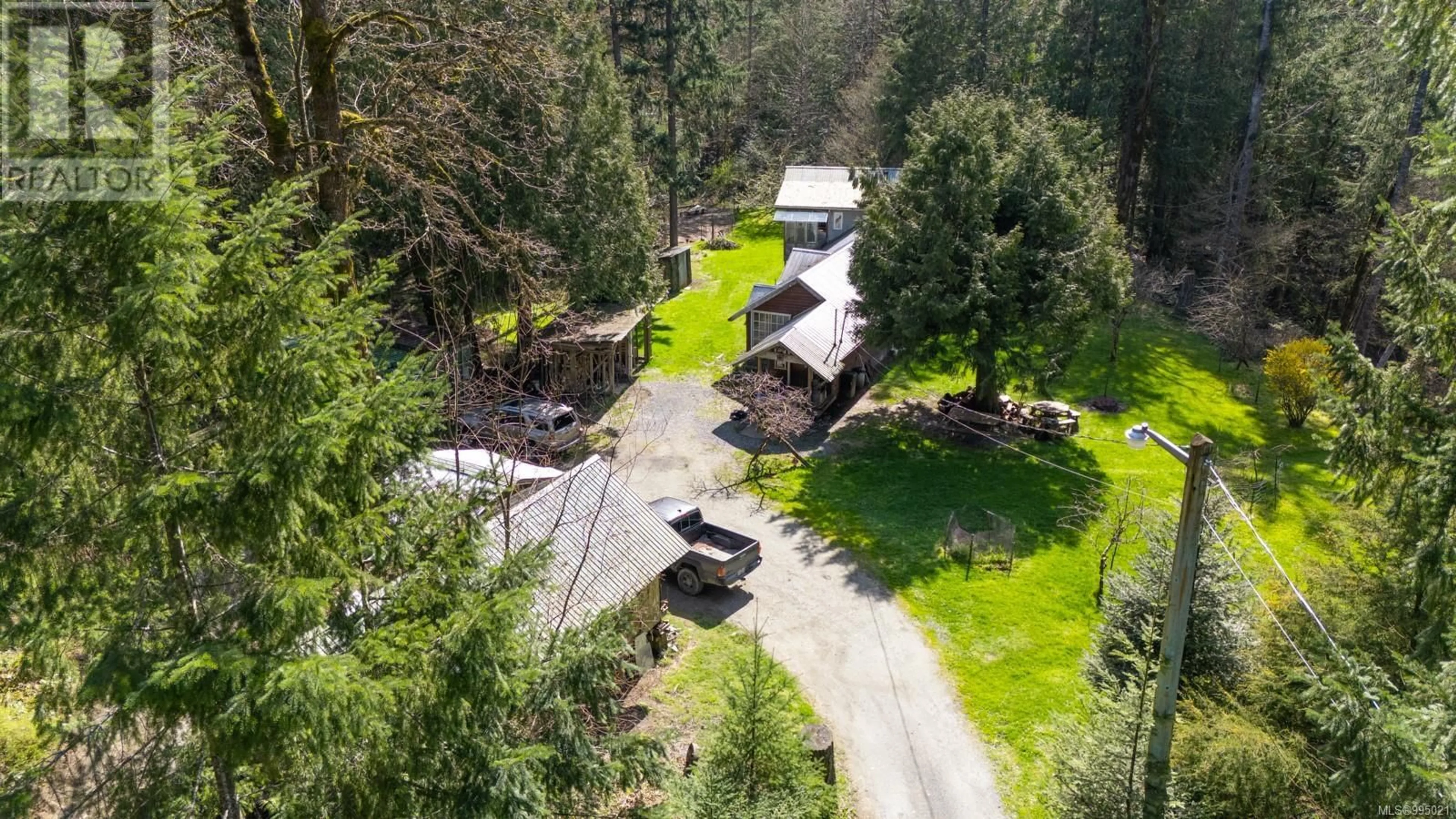 A pic from outside/outdoor area/front of a property/back of a property/a pic from drone, forest/trees view for 8706 TRANS CANADA HIGHWAY, Chemainus British Columbia V0R1K4