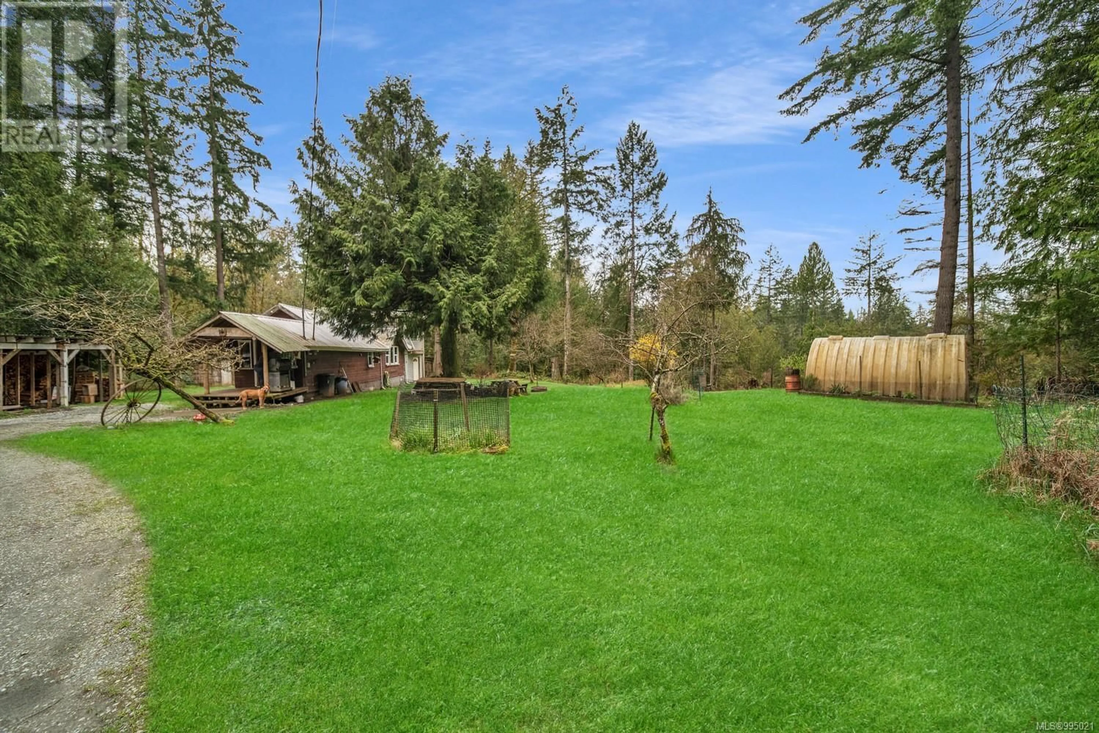 A pic from outside/outdoor area/front of a property/back of a property/a pic from drone, forest/trees view for 8706 TRANS CANADA HIGHWAY, Chemainus British Columbia V0R1K4