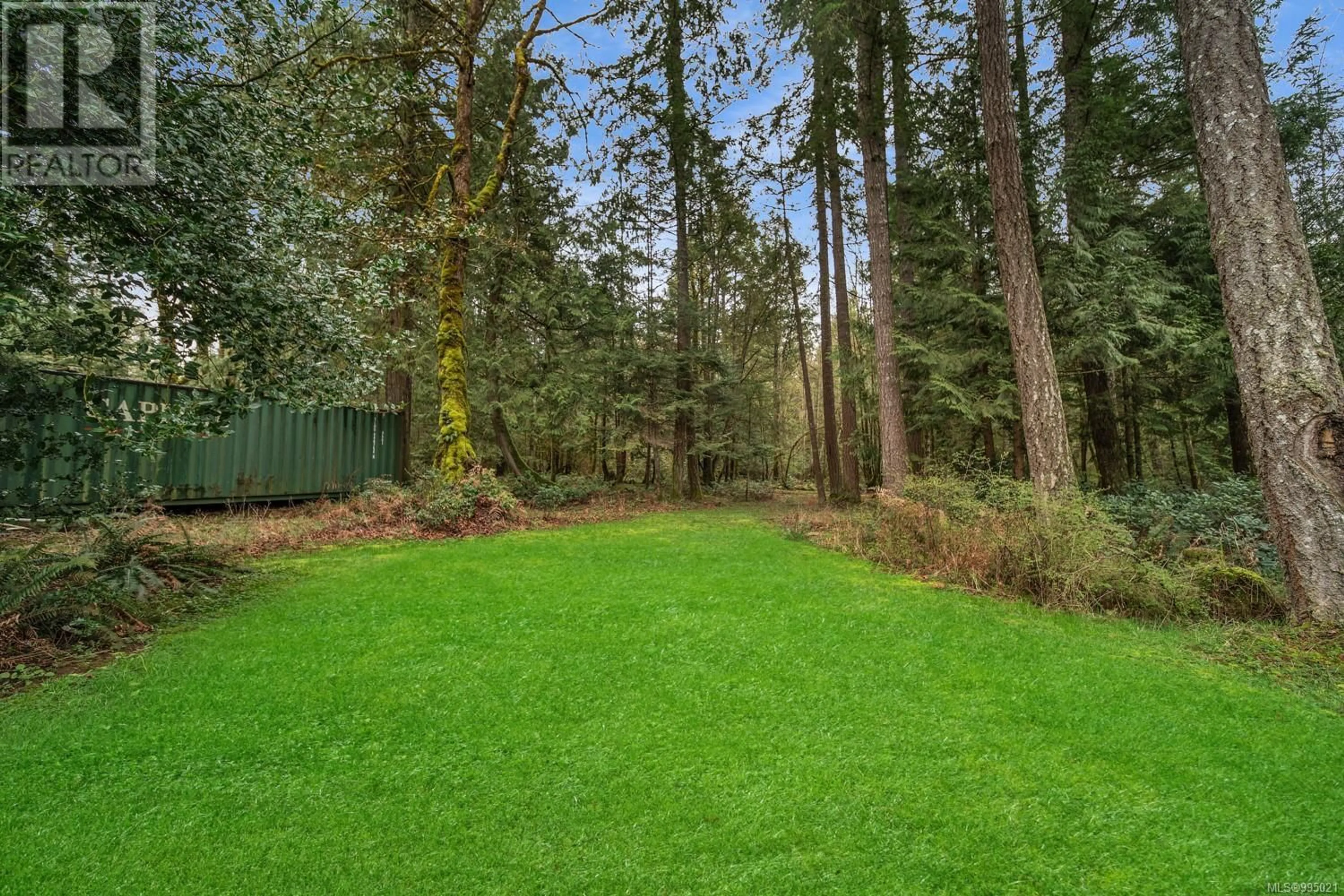 A pic from outside/outdoor area/front of a property/back of a property/a pic from drone, forest/trees view for 8706 TRANS CANADA HIGHWAY, Chemainus British Columbia V0R1K4