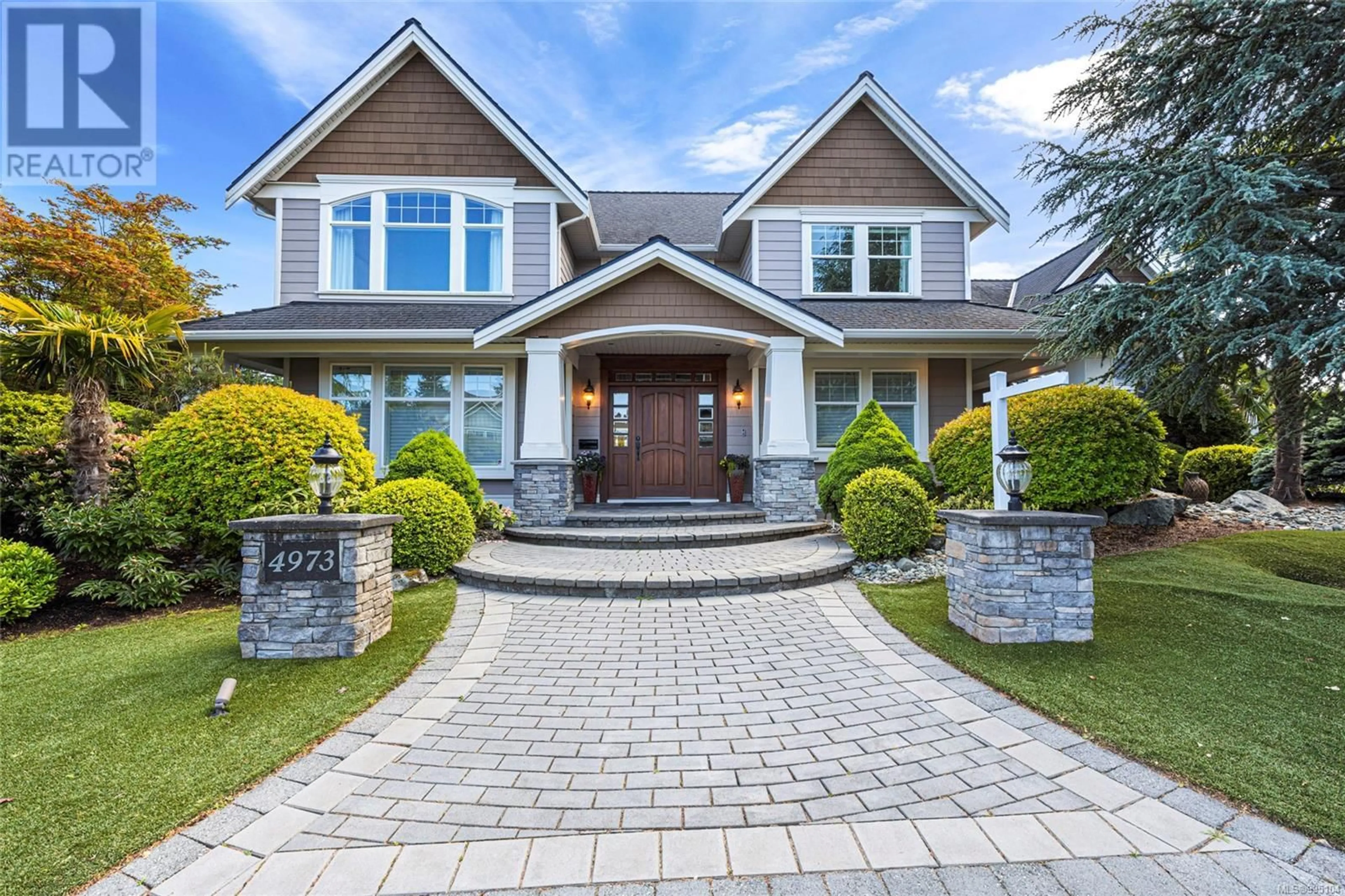 Home with brick exterior material, street for 4973 LA QUINTA PLACE, Saanich British Columbia V8Y3G9