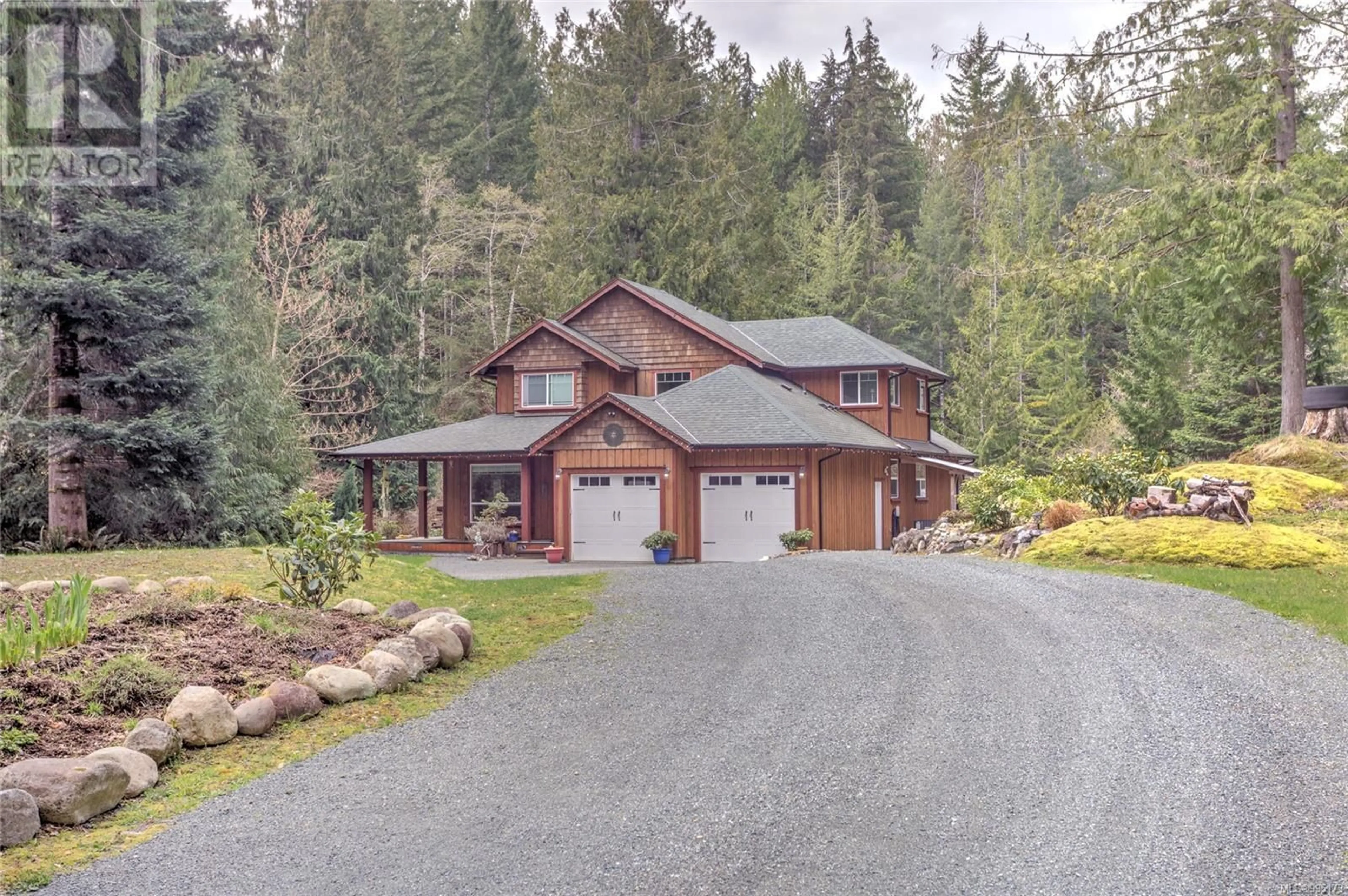 A pic from outside/outdoor area/front of a property/back of a property/a pic from drone, street for 7420 NANTREE ROAD, Lake Cowichan British Columbia V0R3E1