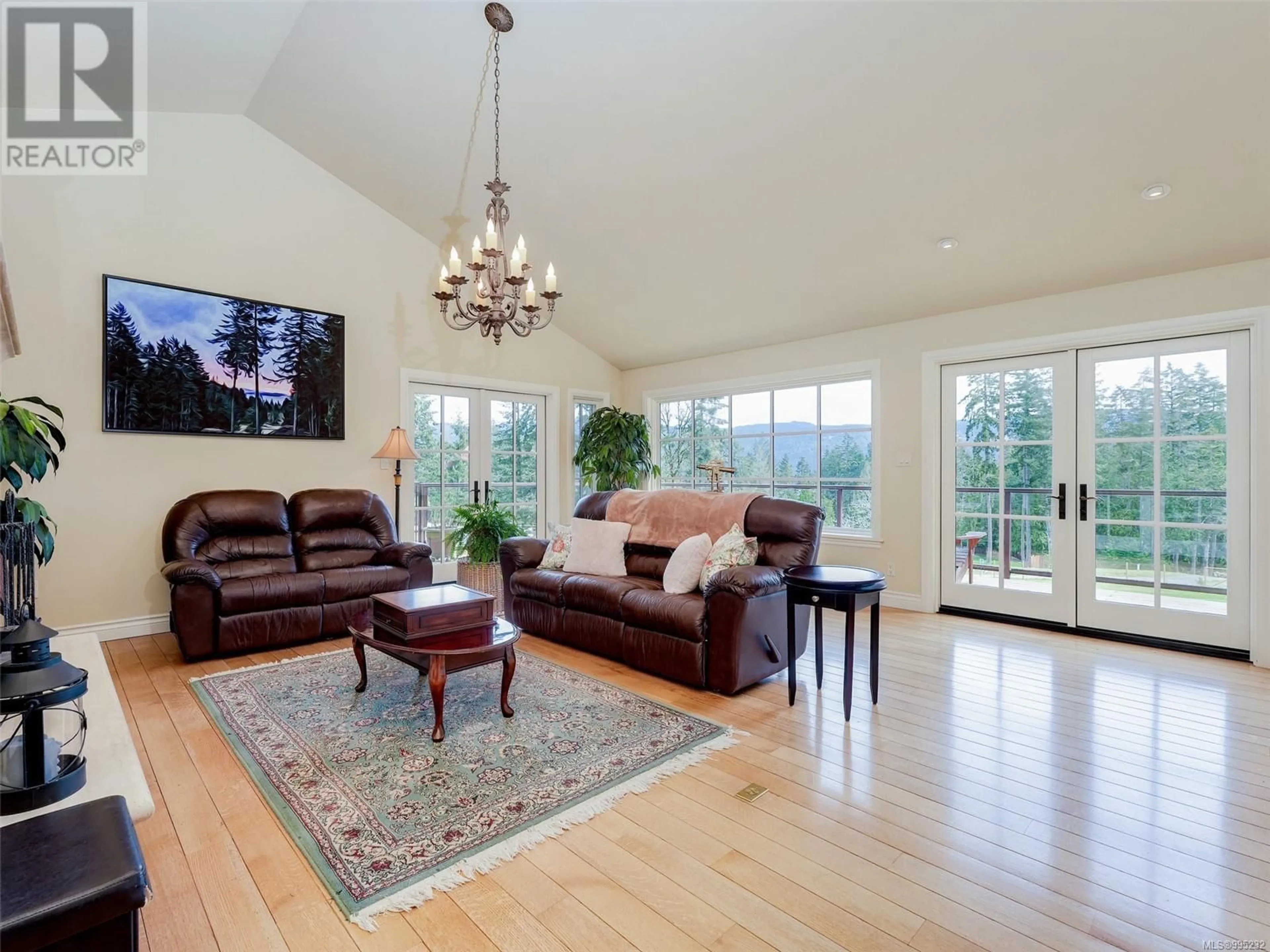 Living room with furniture, wood/laminate floor for 956 CHERRY POINT ROAD, Cowichan Bay British Columbia V0R1N2