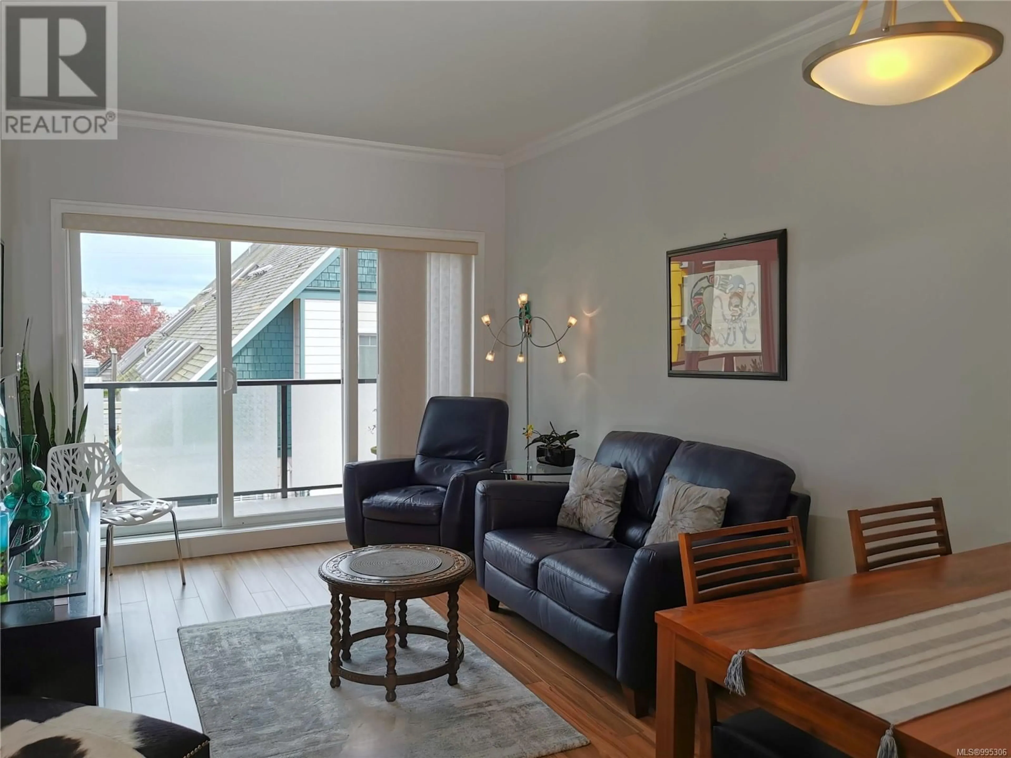 Living room with furniture, wood/laminate floor for 307 - 9751 FOURTH STREET, Sidney British Columbia V8L2Y9