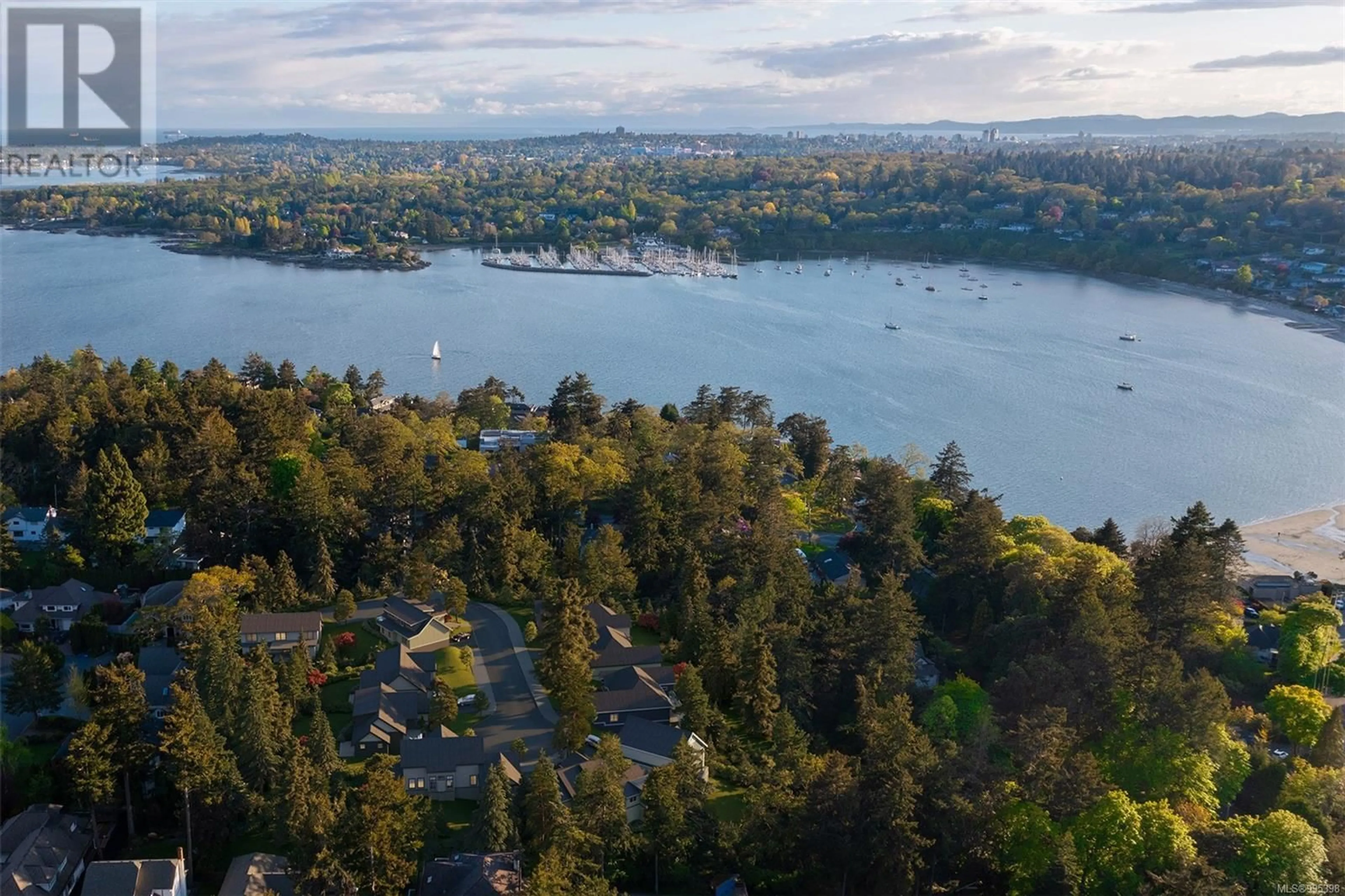 A pic from outside/outdoor area/front of a property/back of a property/a pic from drone, water/lake/river/ocean view for 3915 WOODLANDS PLACE, Saanich British Columbia V8N4J7
