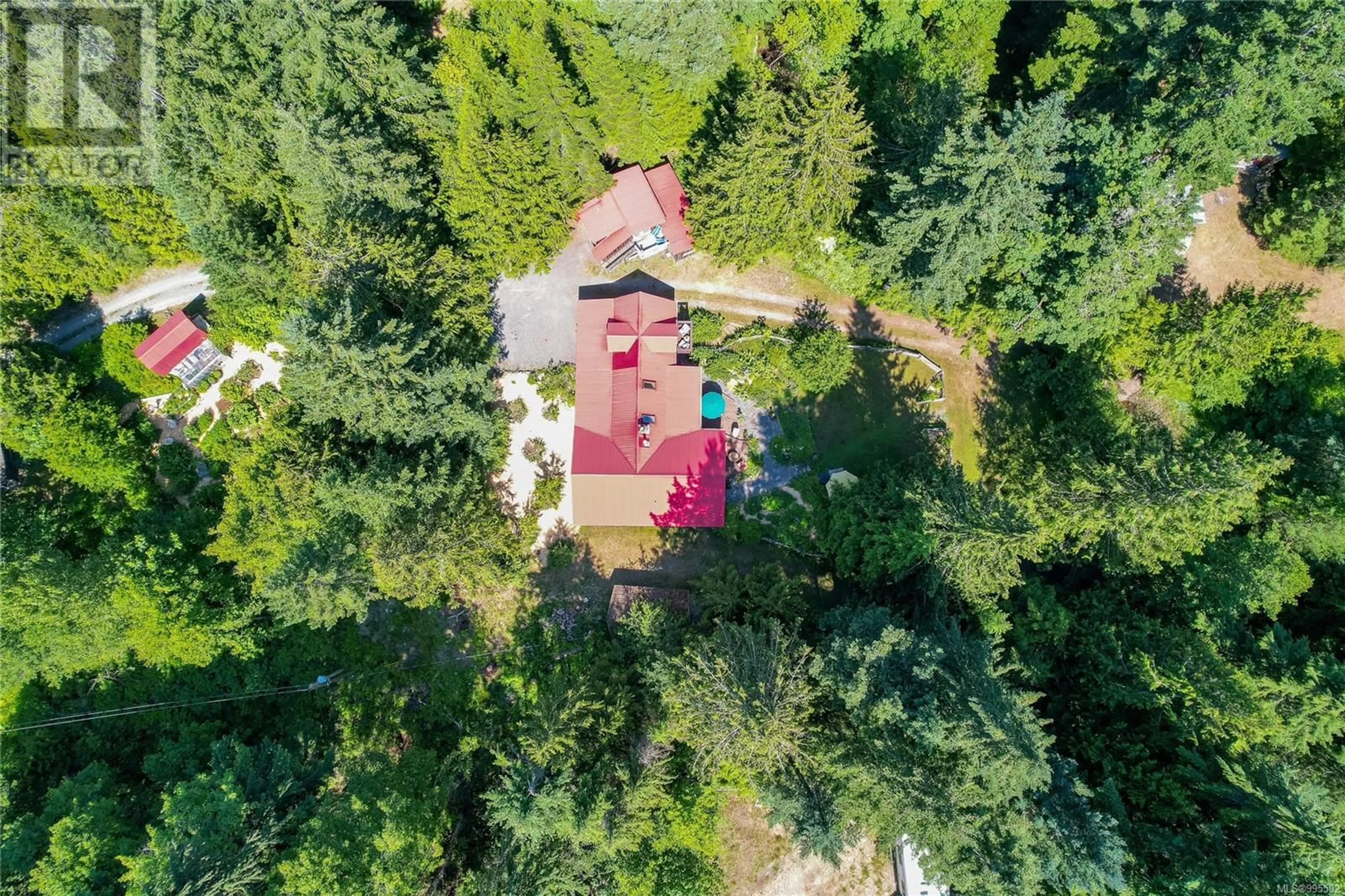 A pic from outside/outdoor area/front of a property/back of a property/a pic from drone, forest/trees view for 5970 STOLTZE ROAD, Duncan British Columbia V9L6H7