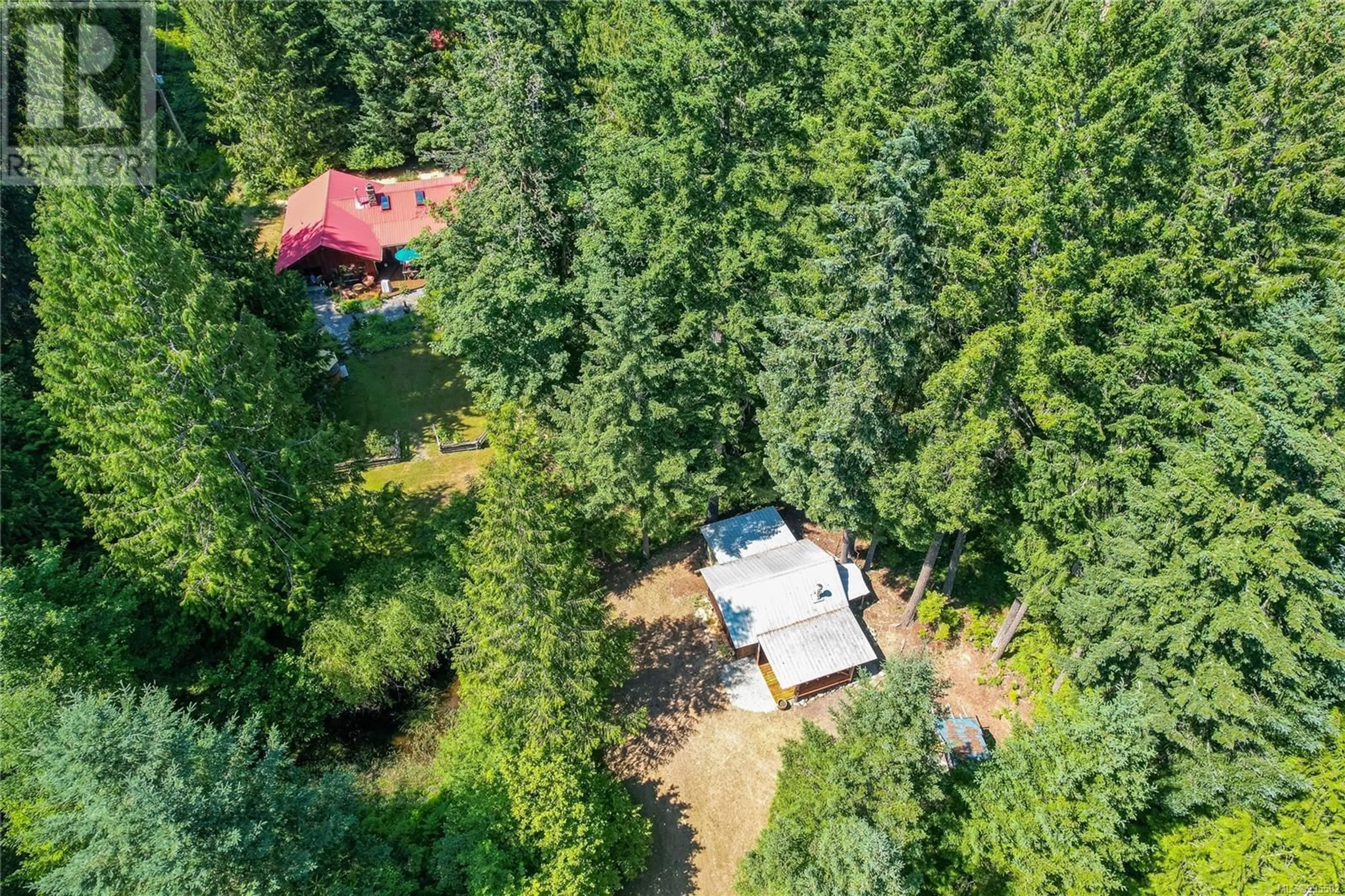 A pic from outside/outdoor area/front of a property/back of a property/a pic from drone, forest/trees view for 5970 STOLTZE ROAD, Duncan British Columbia V9L6H7