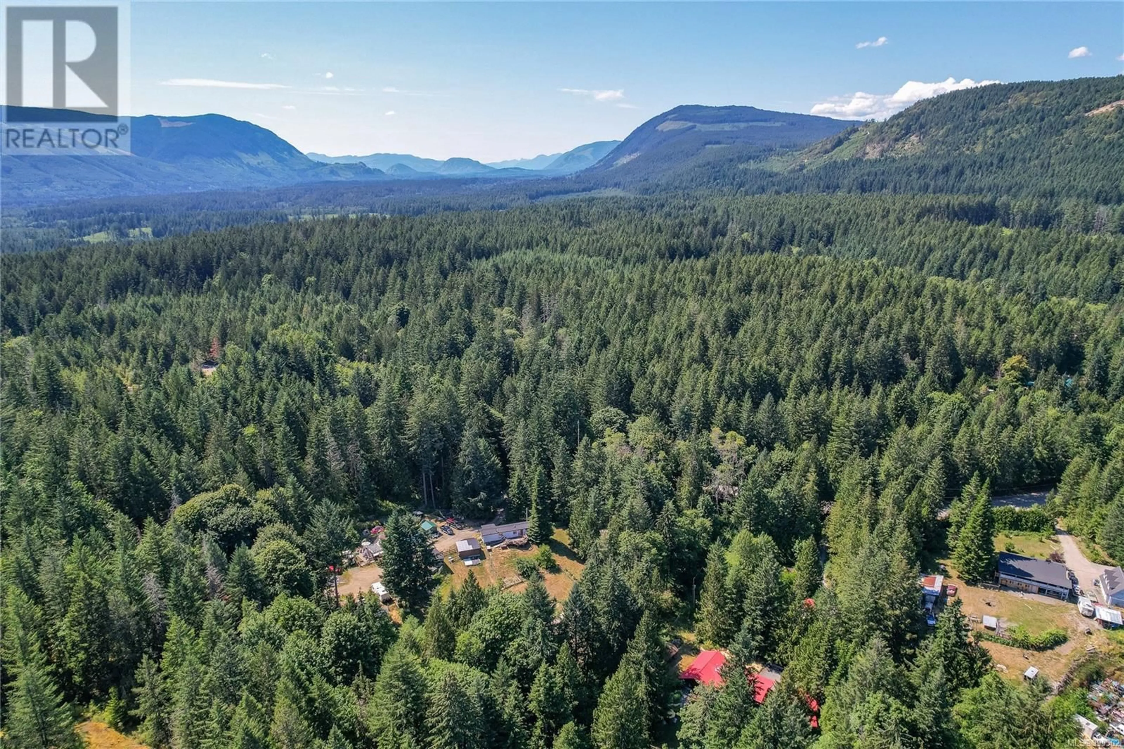 A pic from outside/outdoor area/front of a property/back of a property/a pic from drone, forest/trees view for 5970 STOLTZE ROAD, Duncan British Columbia V9L6H7