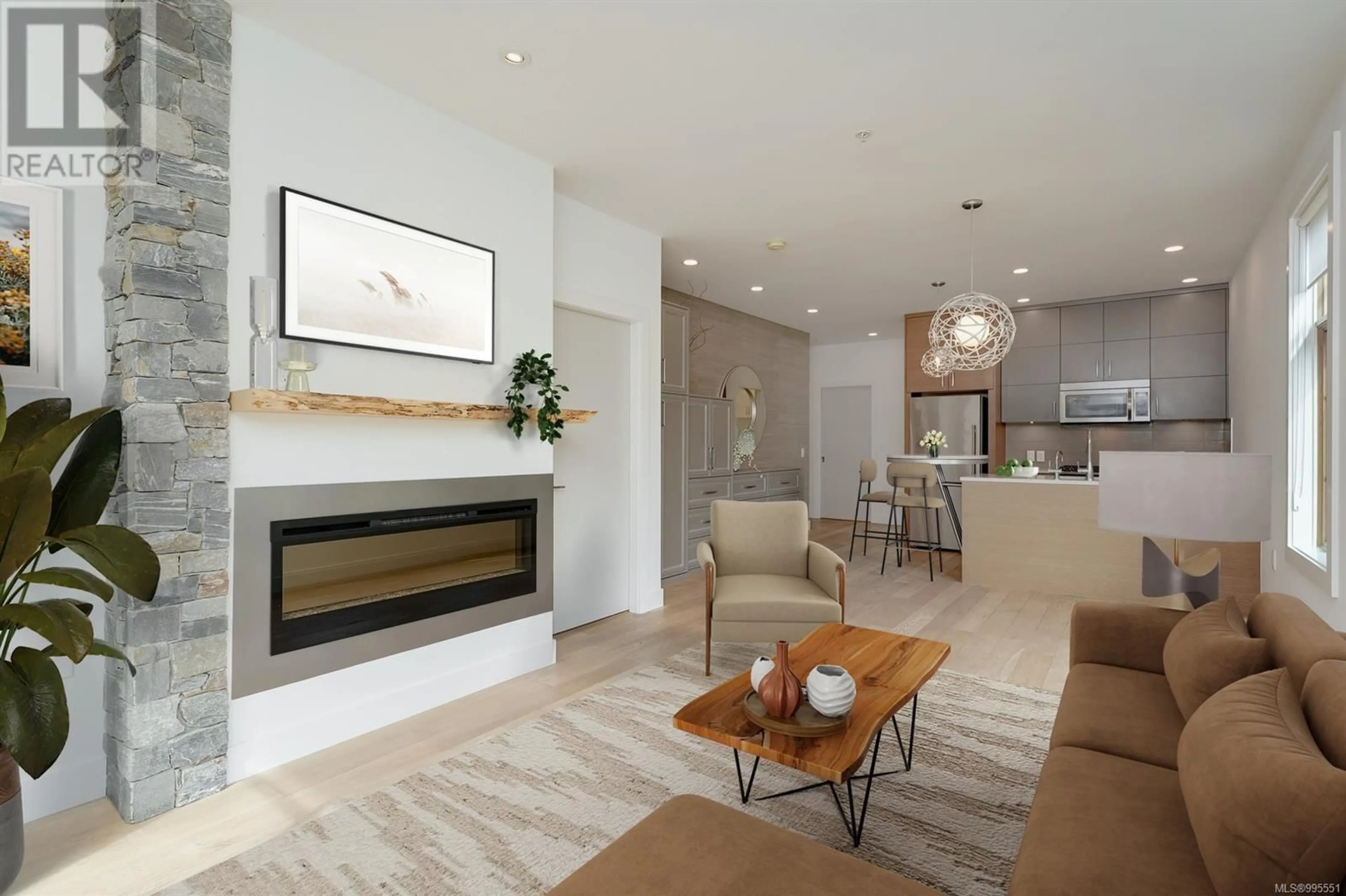 Living room with furniture, unknown for 203 - 2580 PENRHYN STREET, Saanich British Columbia V8N1G3