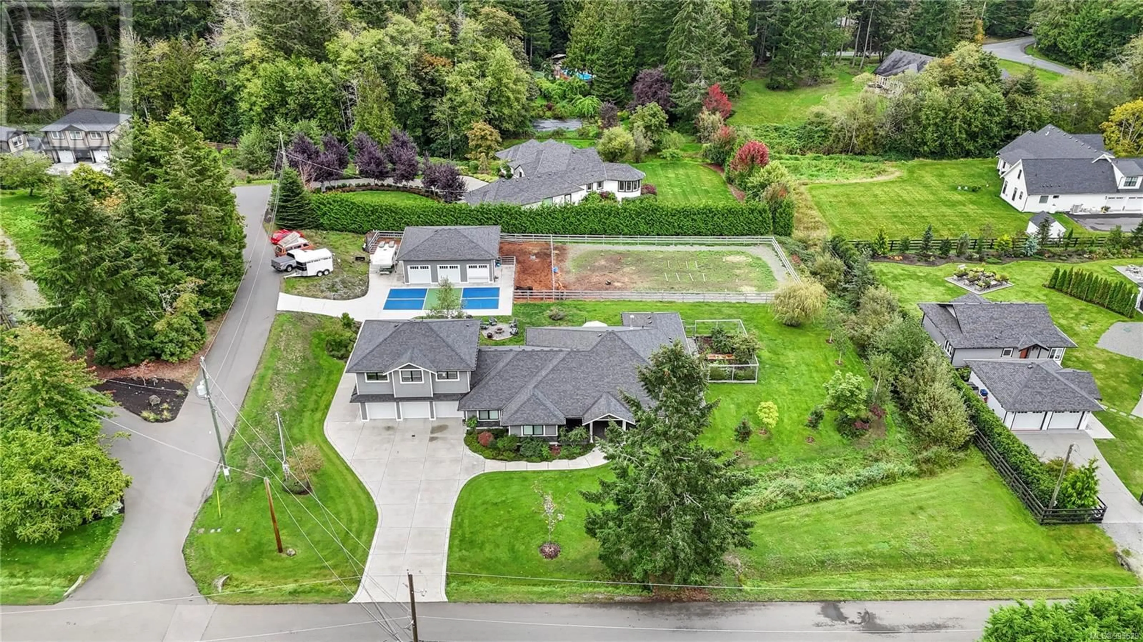 A pic from outside/outdoor area/front of a property/back of a property/a pic from drone, street for 11329 HUMMINGBIRD PLACE, North Saanich British Columbia V8L5S3