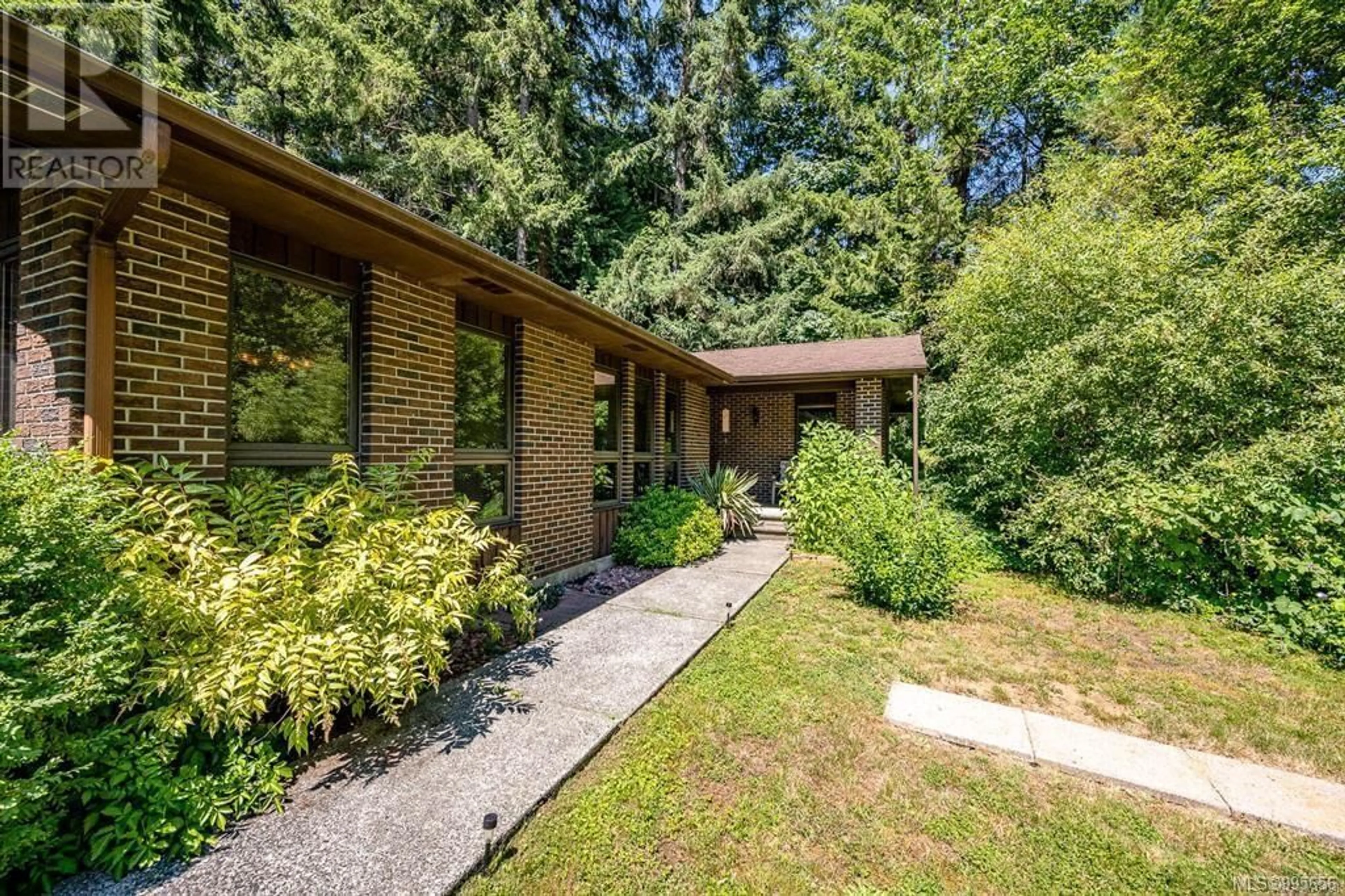Home with brick exterior material, unknown for 7789 LITTLE WAY, Fanny Bay British Columbia V0R1W0