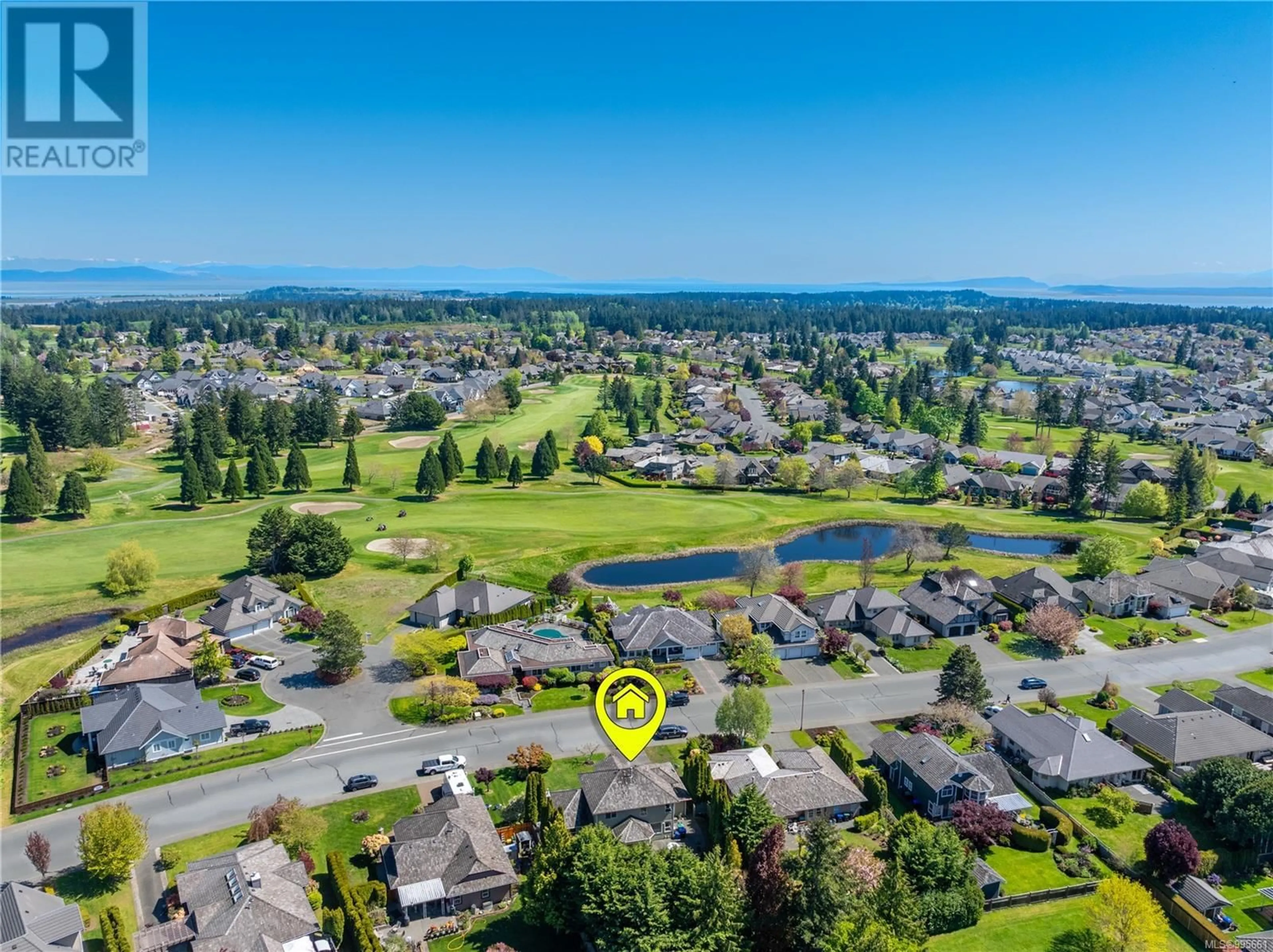 A pic from outside/outdoor area/front of a property/back of a property/a pic from drone, water/lake/river/ocean view for 729 CROWN ISLE DRIVE, Courtenay British Columbia V9N8R5