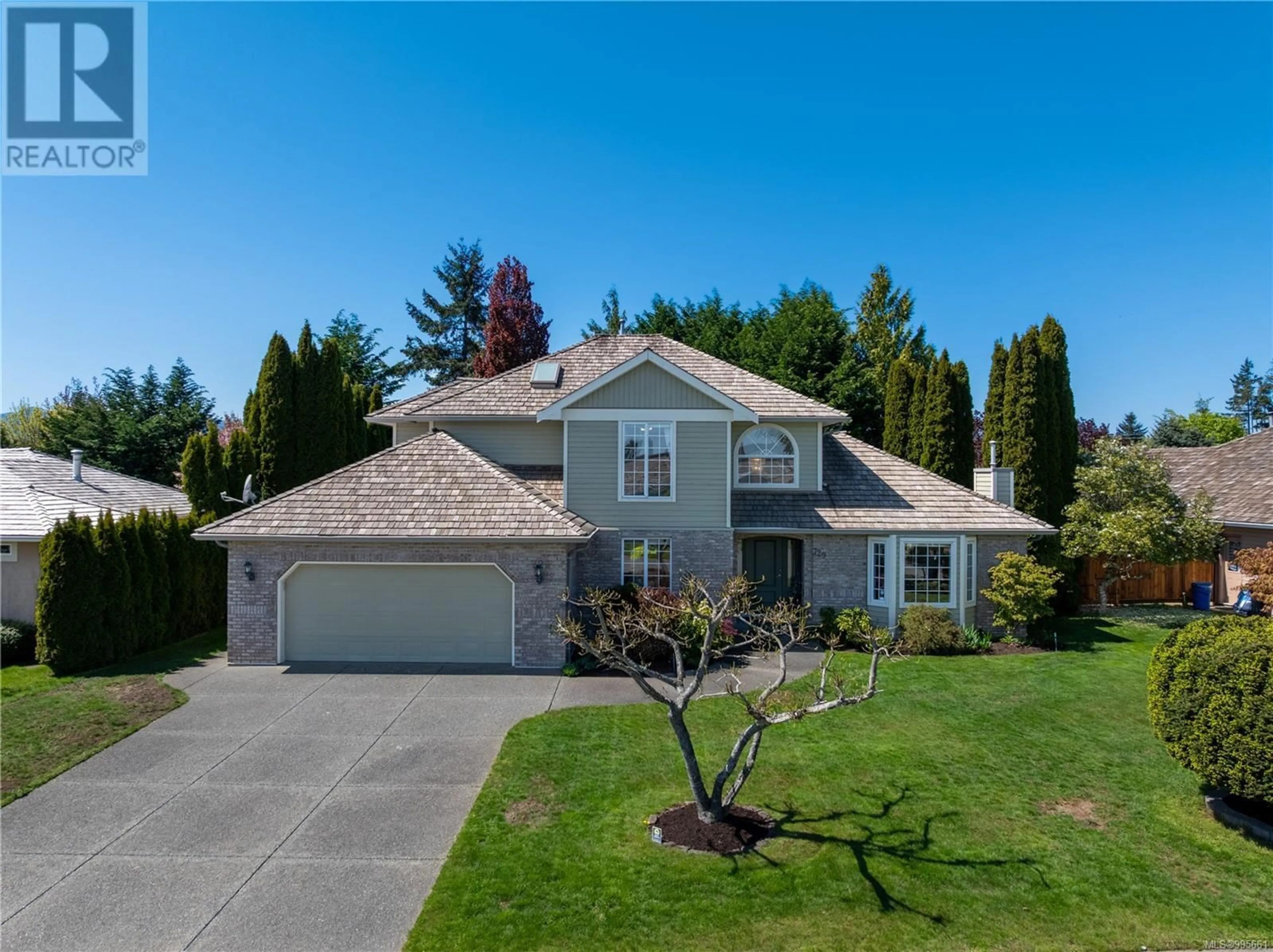 Home with vinyl exterior material, street for 729 CROWN ISLE DRIVE, Courtenay British Columbia V9N8R5