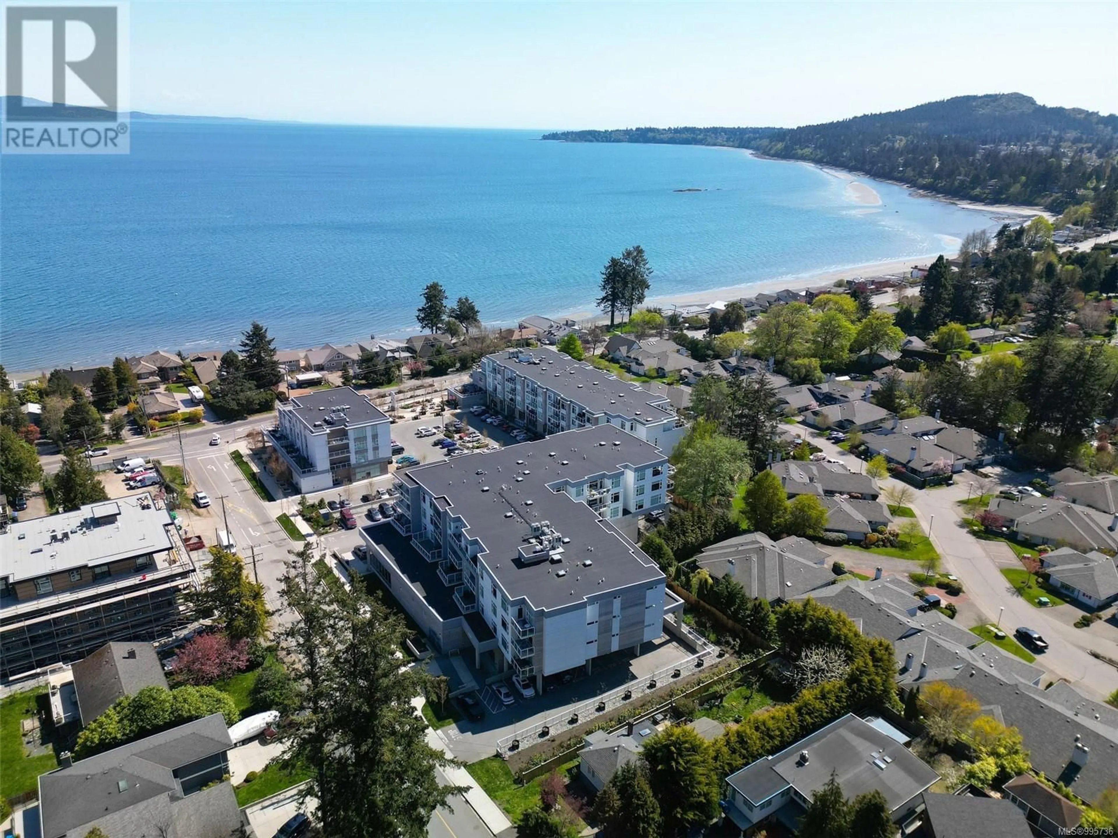 A pic from outside/outdoor area/front of a property/back of a property/a pic from drone, water/lake/river/ocean view for 309 - 5120 CORDOVA BAY ROAD, Saanich British Columbia V8Y2K5
