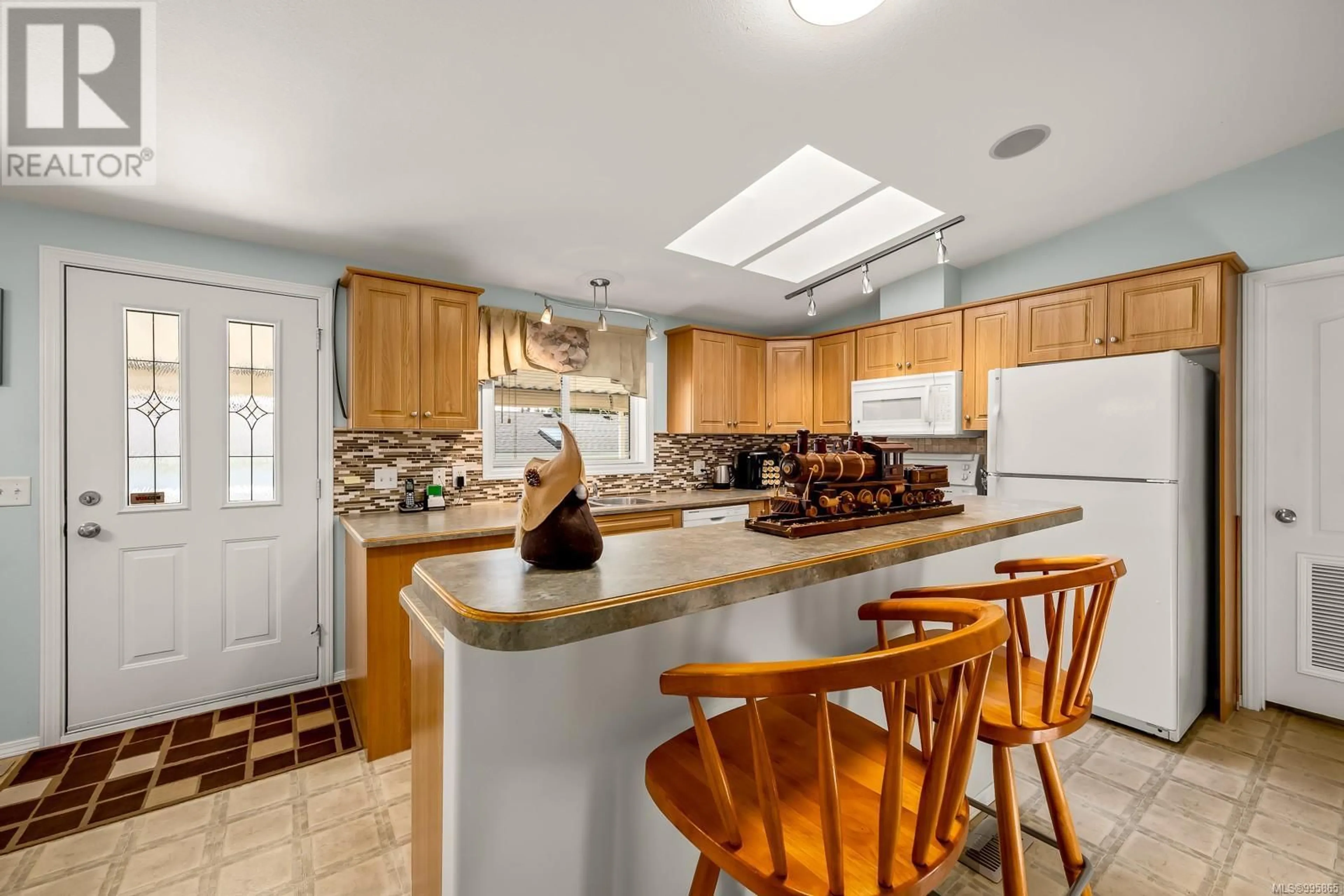 Open concept kitchen, ceramic/tile floor for 97 - 4714 MUIR ROAD, Courtenay British Columbia V9N8Z6