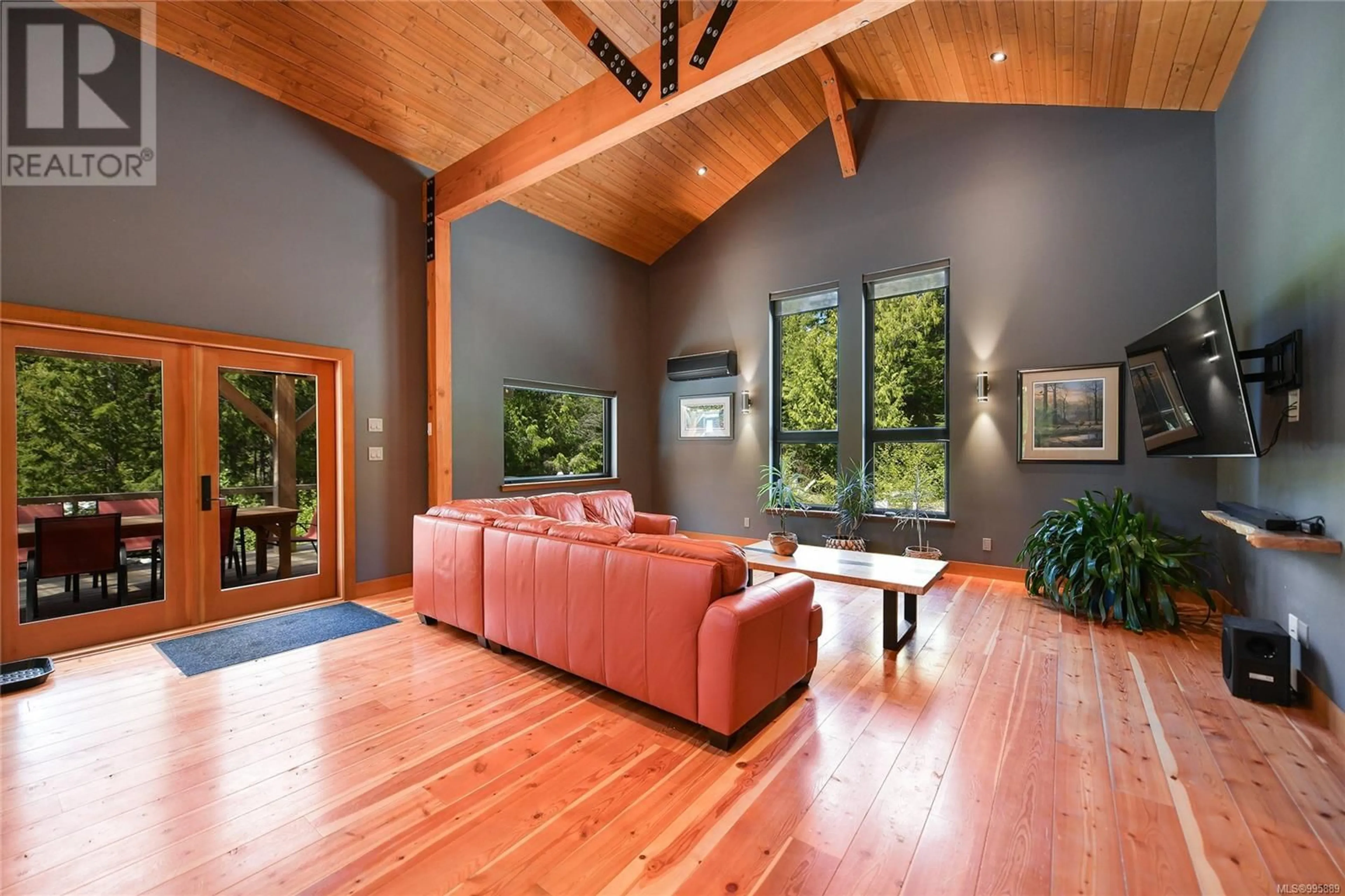 Living room with furniture, wood/laminate floor for 17176 OSPREY PLACE, Port Renfrew British Columbia V0S1K0