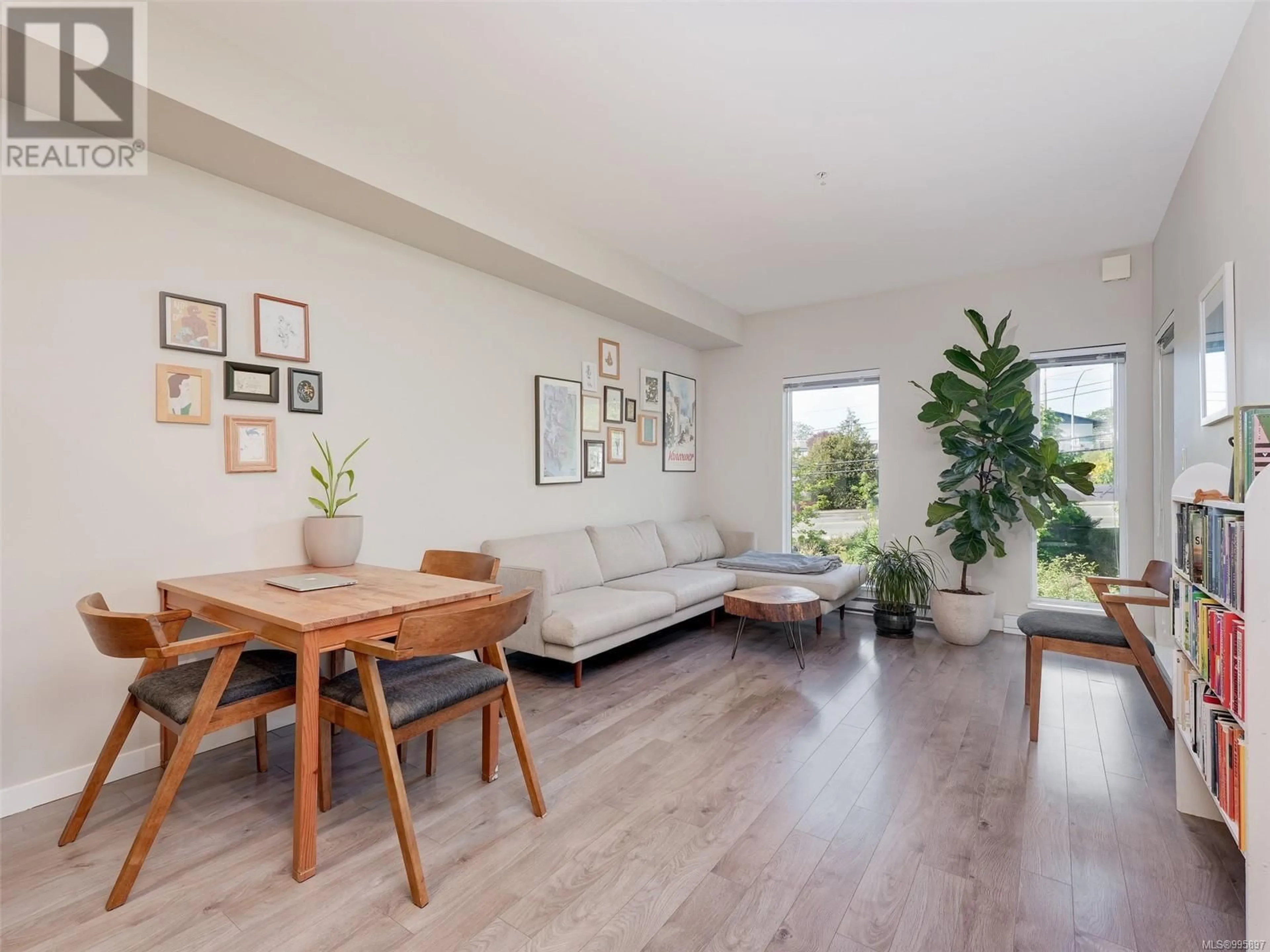 Living room with furniture, wood/laminate floor for 420 - 767 TYEE ROAD, Victoria British Columbia V9A0G5