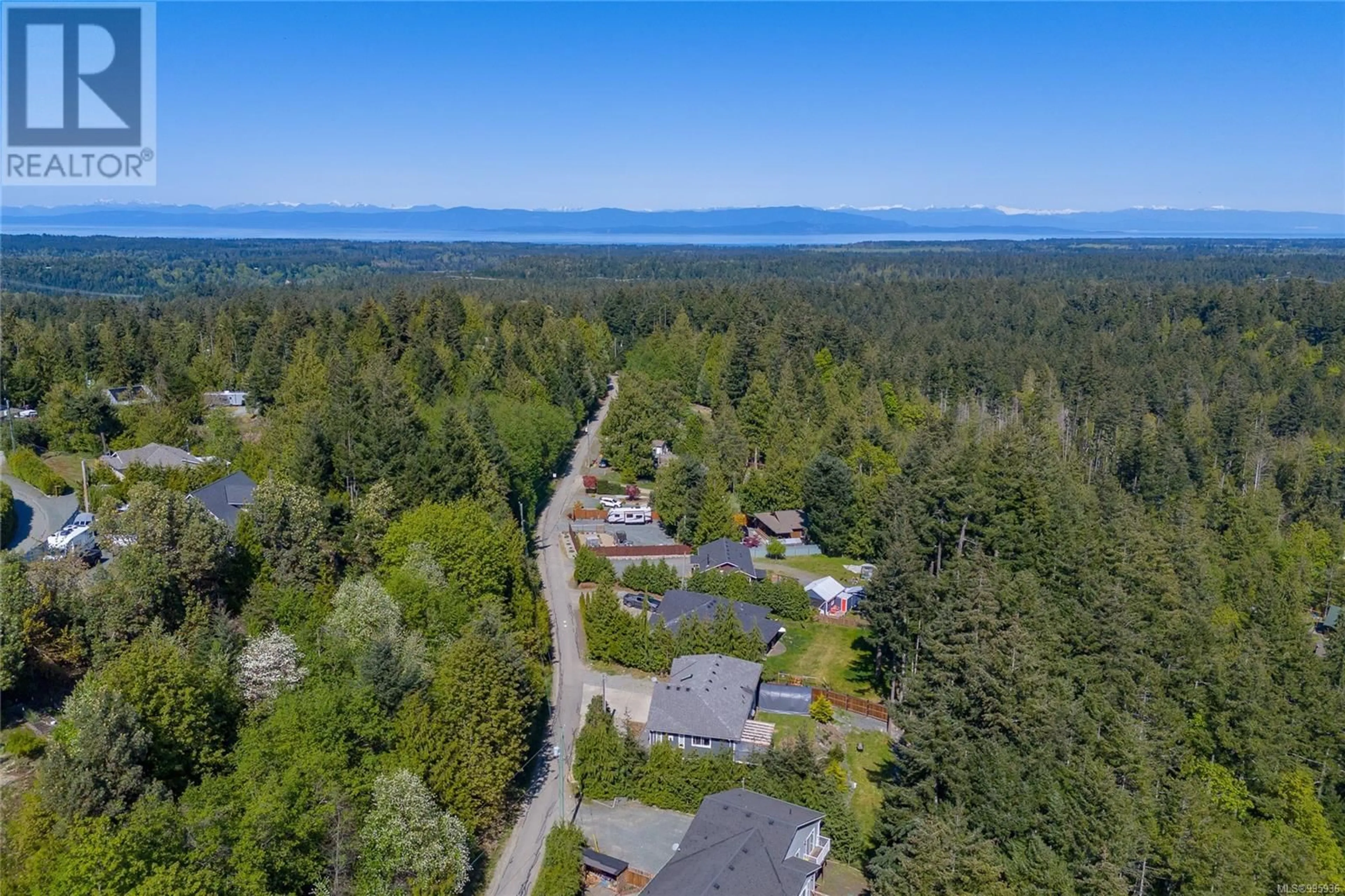 A pic from outside/outdoor area/front of a property/back of a property/a pic from drone, water/lake/river/ocean view for 1728 SPIRIT WAY, Qualicum Beach British Columbia V9K2S3