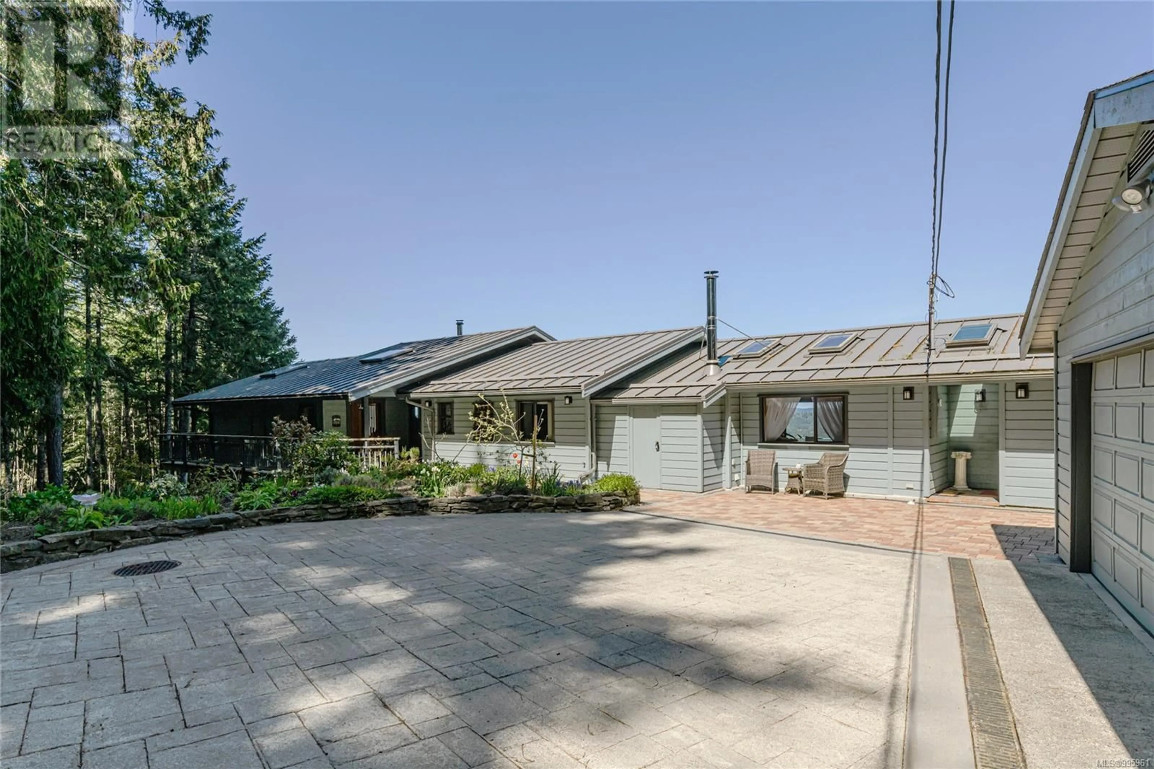 A pic from outside/outdoor area/front of a property/back of a property/a pic from drone, street for 234 WILKIE WAY, Salt Spring British Columbia V8K2J4