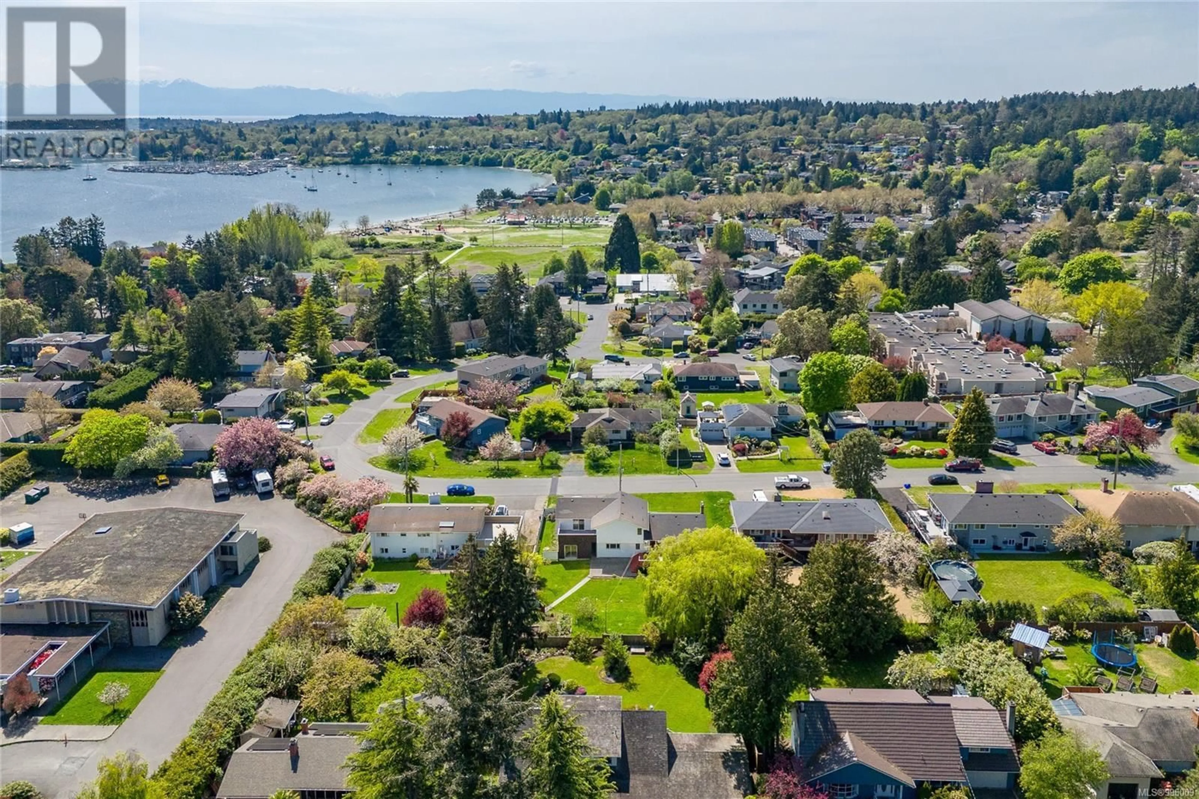 A pic from outside/outdoor area/front of a property/back of a property/a pic from drone, water/lake/river/ocean view for 3951 CHERRILEE CRESCENT, Saanich British Columbia V8N1R7
