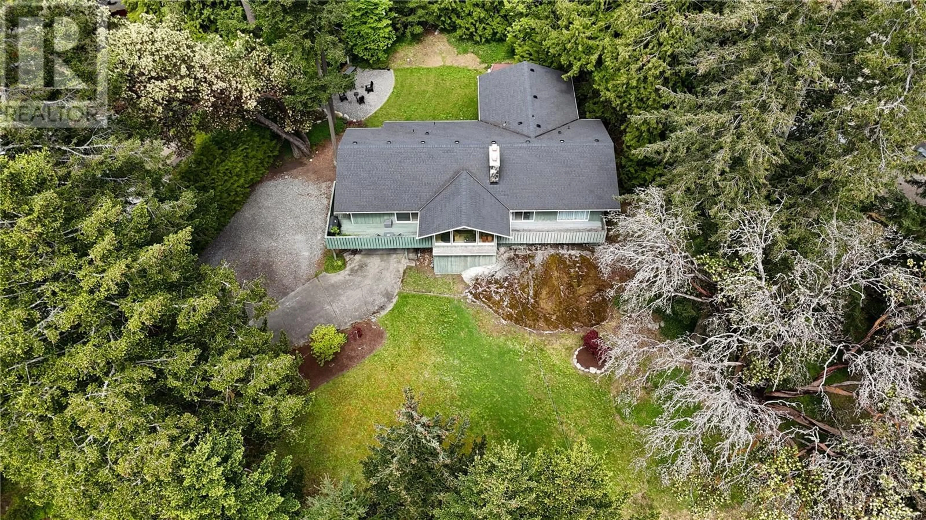 A pic from outside/outdoor area/front of a property/back of a property/a pic from drone, unknown for 1940 SANDOVER CRESCENT, North Saanich British Columbia V8L1A1