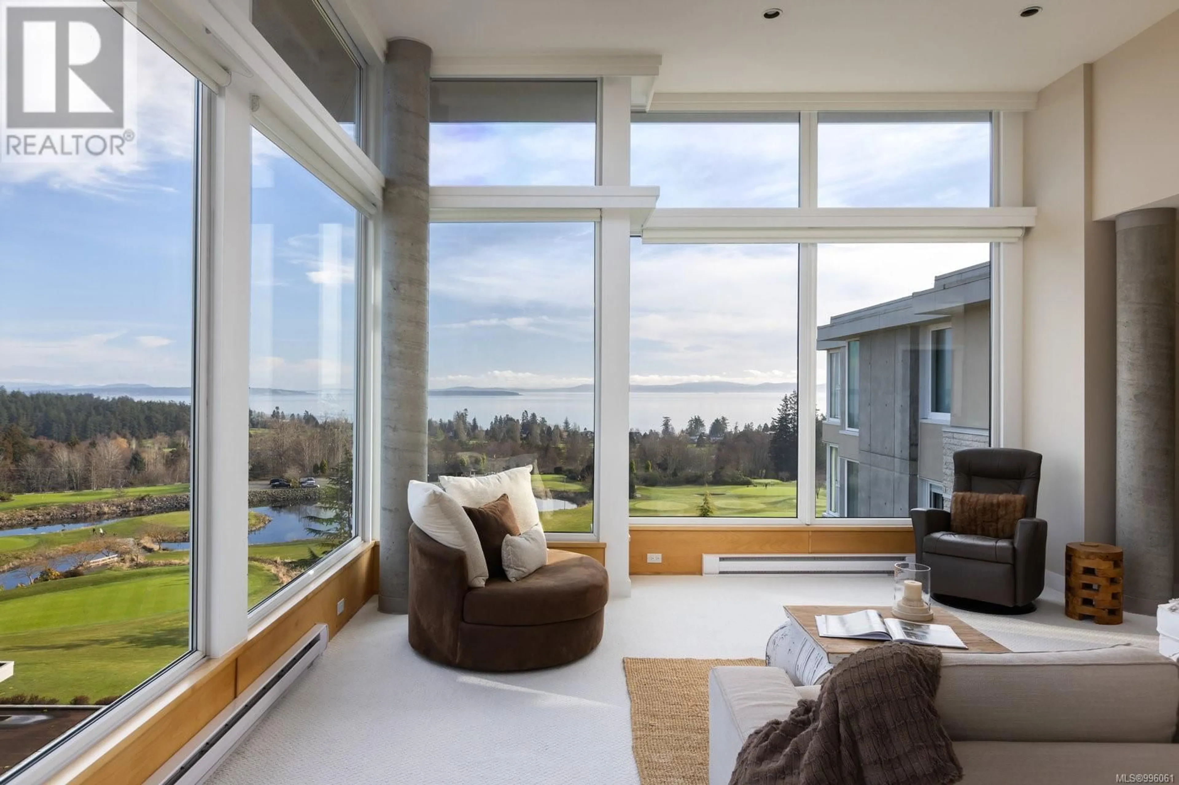 Living room with furniture, unknown for 604 - 5350 SAYWARD HILL CRESCENT, Saanich British Columbia V8Y3H9