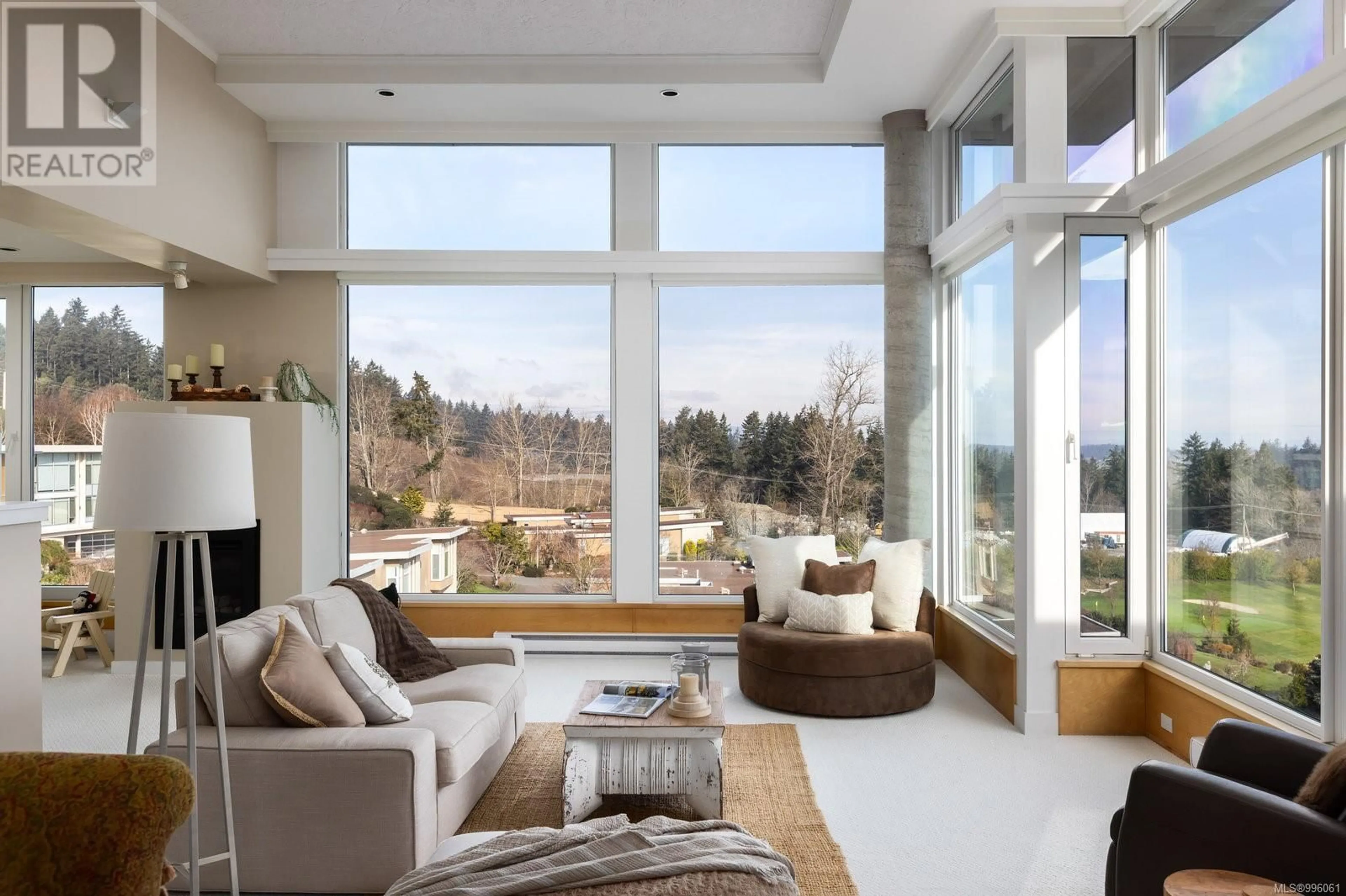 Living room with furniture, unknown for 604 - 5350 SAYWARD HILL CRESCENT, Saanich British Columbia V8Y3H9