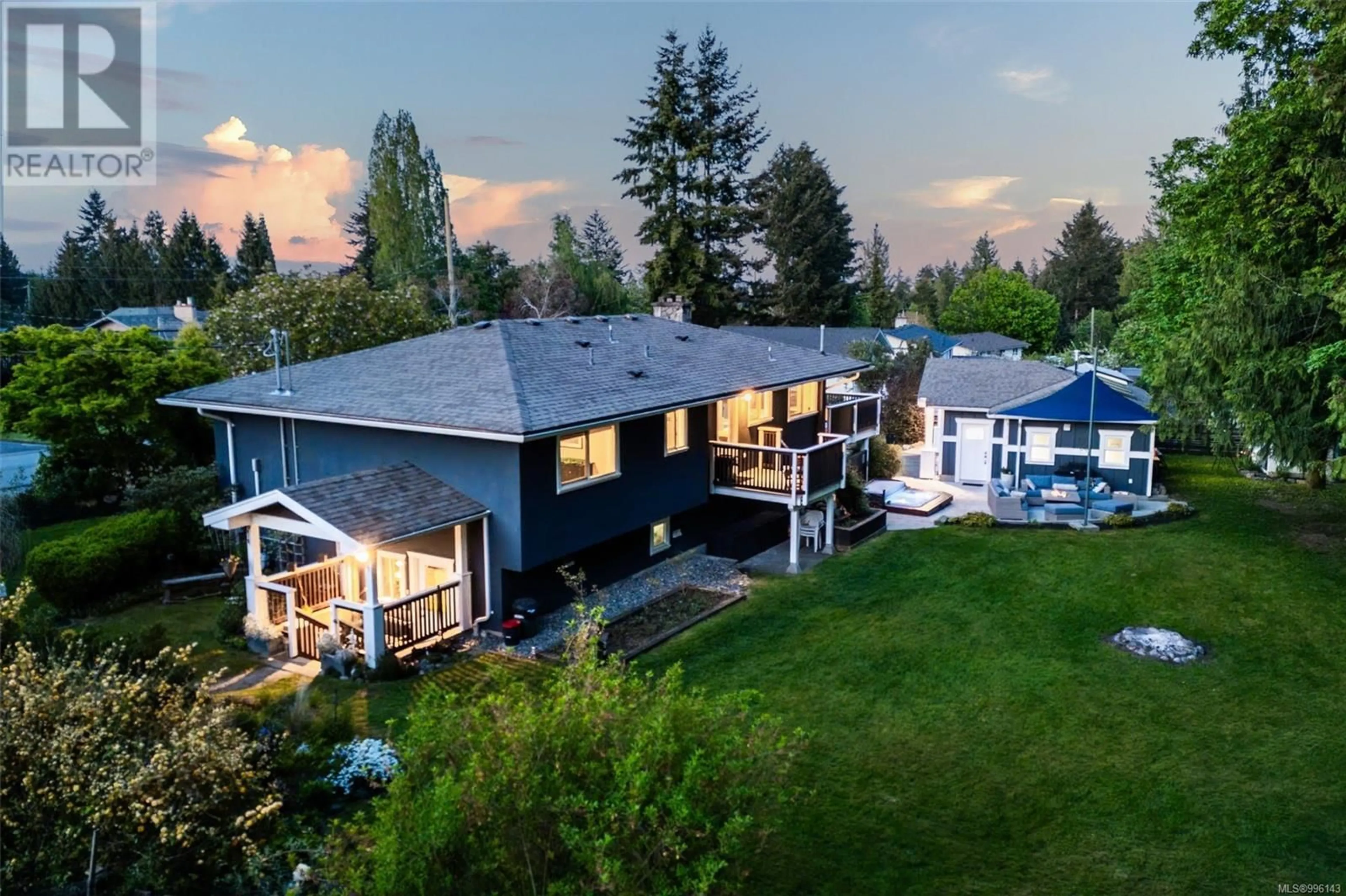 A pic from outside/outdoor area/front of a property/back of a property/a pic from drone, mountain view for 2457 MEADOWLAND DRIVE, Central Saanich British Columbia V8Z5P6