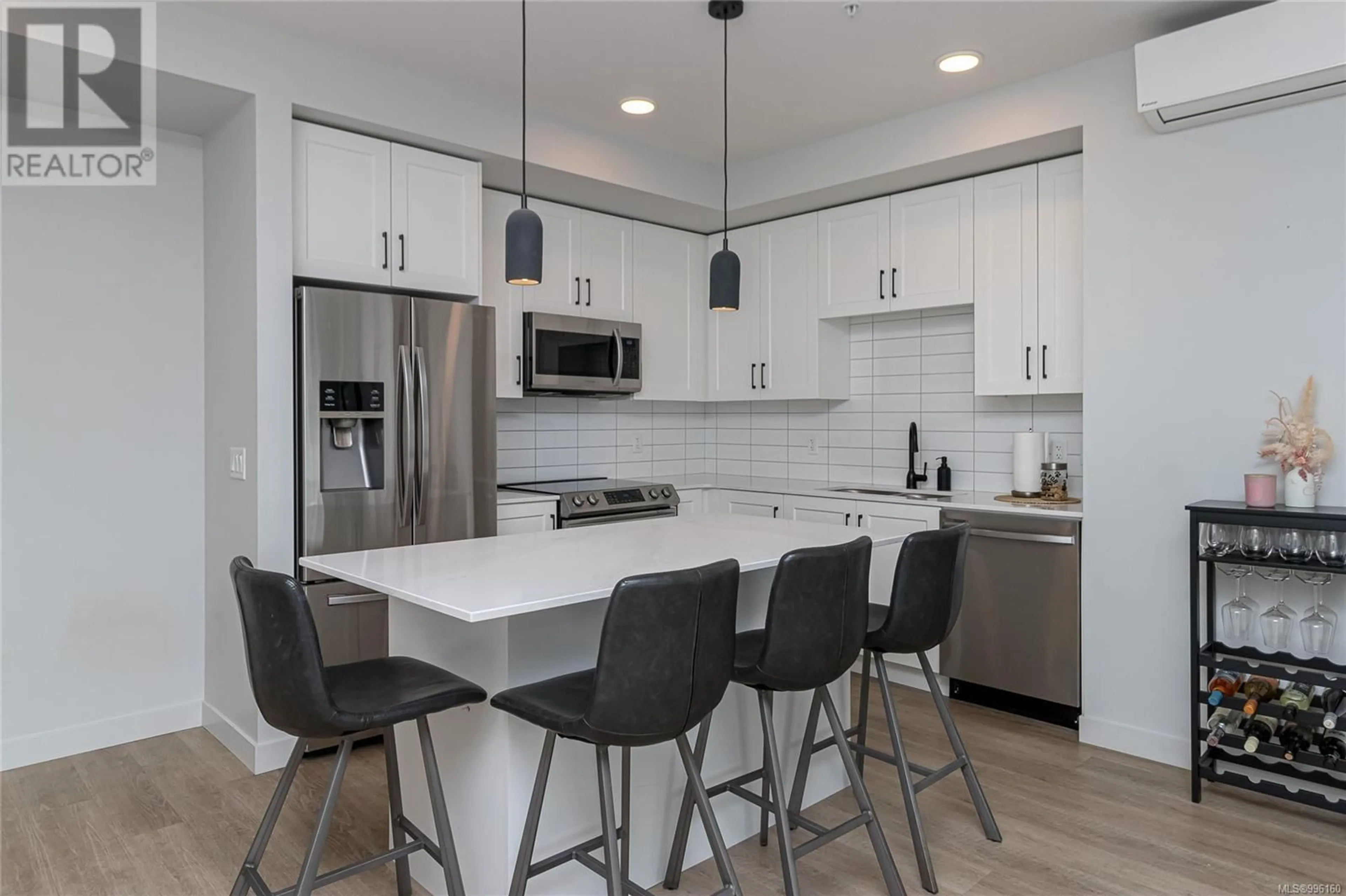 Open concept kitchen, ceramic/tile floor for 407 - 2465 GATEWAY ROAD, Langford British Columbia V9B6R1