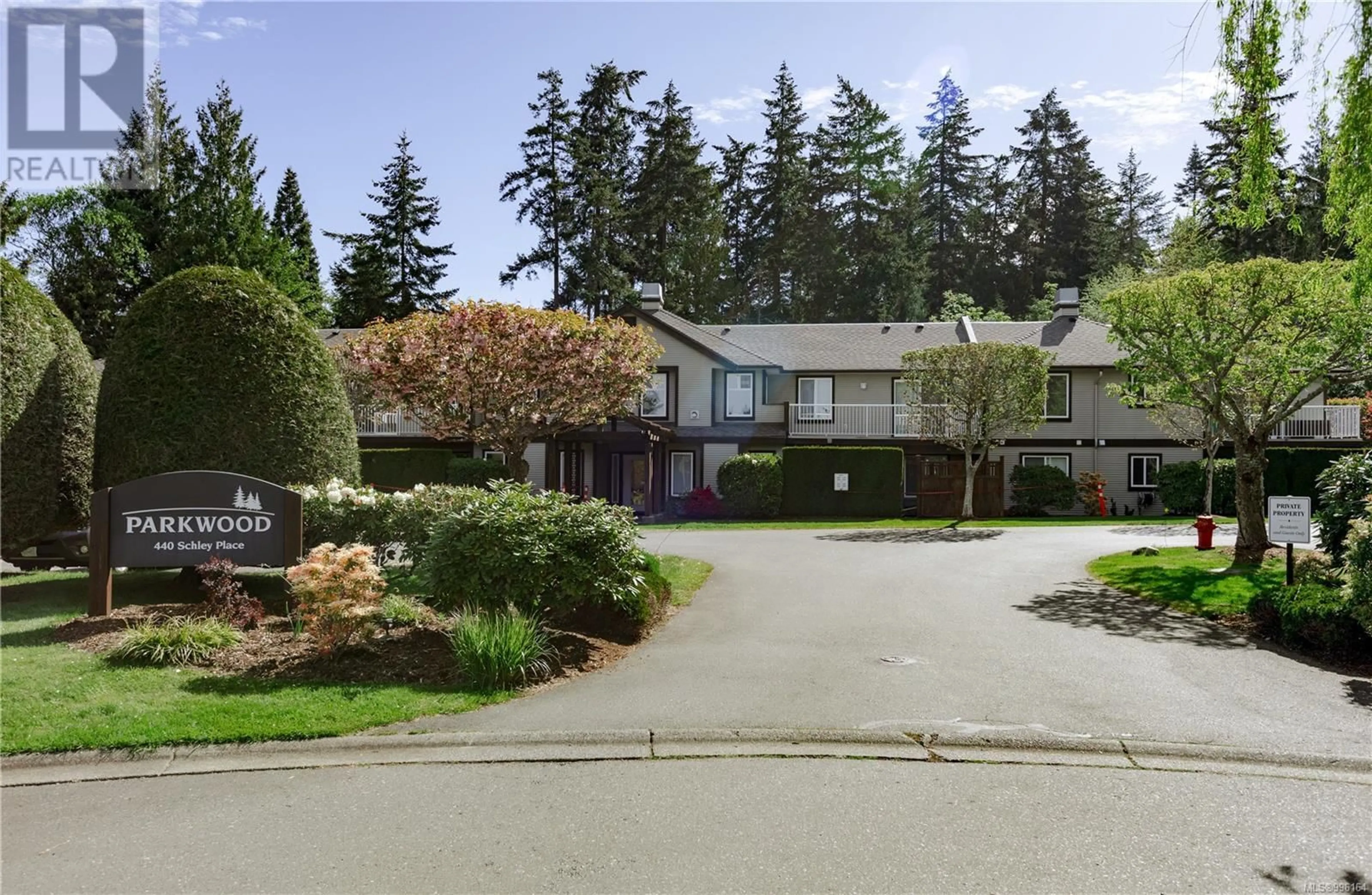 A pic from outside/outdoor area/front of a property/back of a property/a pic from drone, street for 208 - 440 SCHLEY PLACE, Qualicum Beach British Columbia V9K2M5