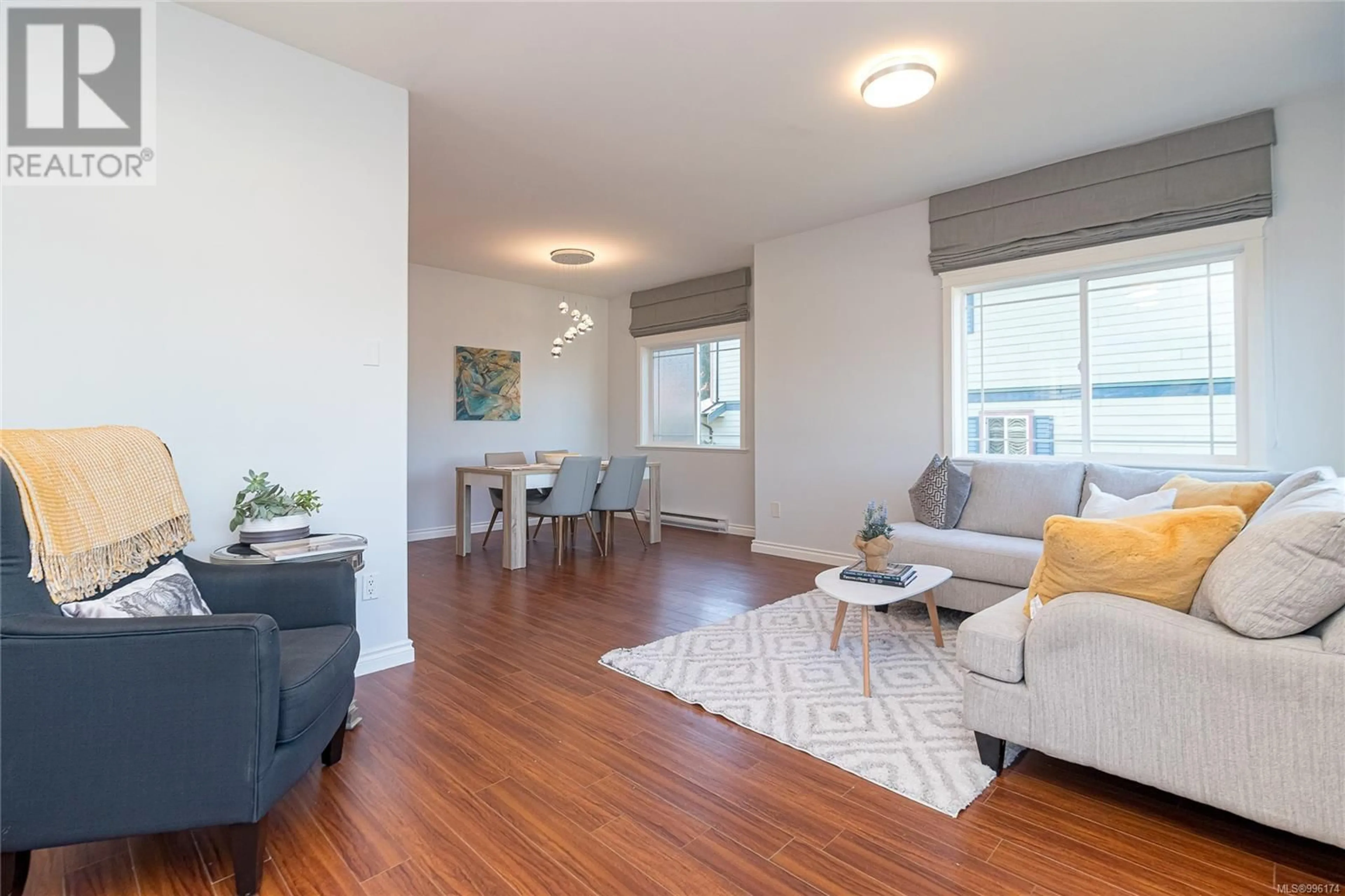 Living room with furniture, wood/laminate floor for 952 WALFRED ROAD, Langford British Columbia V9C2P4