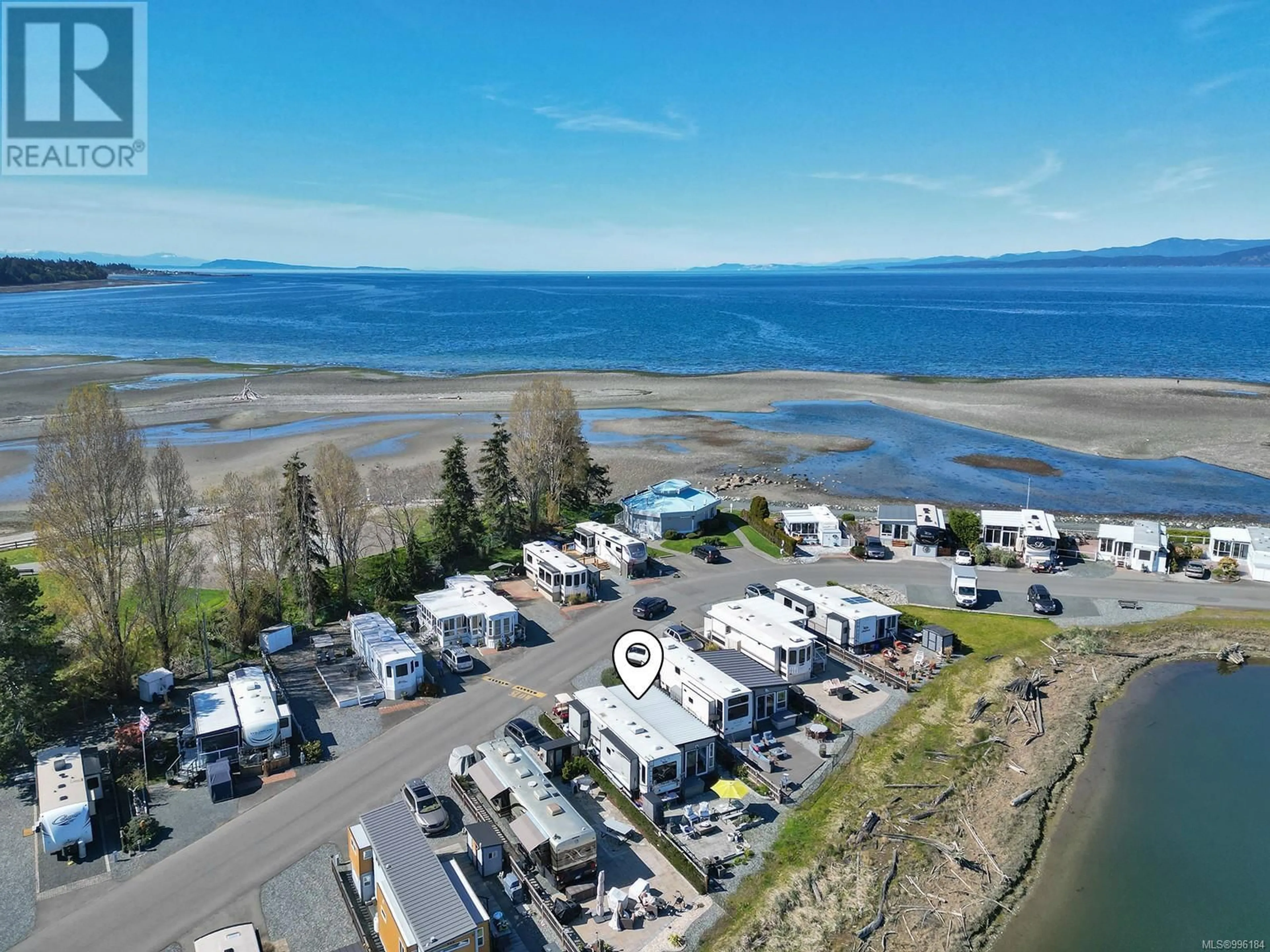 A pic from outside/outdoor area/front of a property/back of a property/a pic from drone, water/lake/river/ocean view for 416 - 200 CORFIELD STREET, Parksville British Columbia V9P2G7