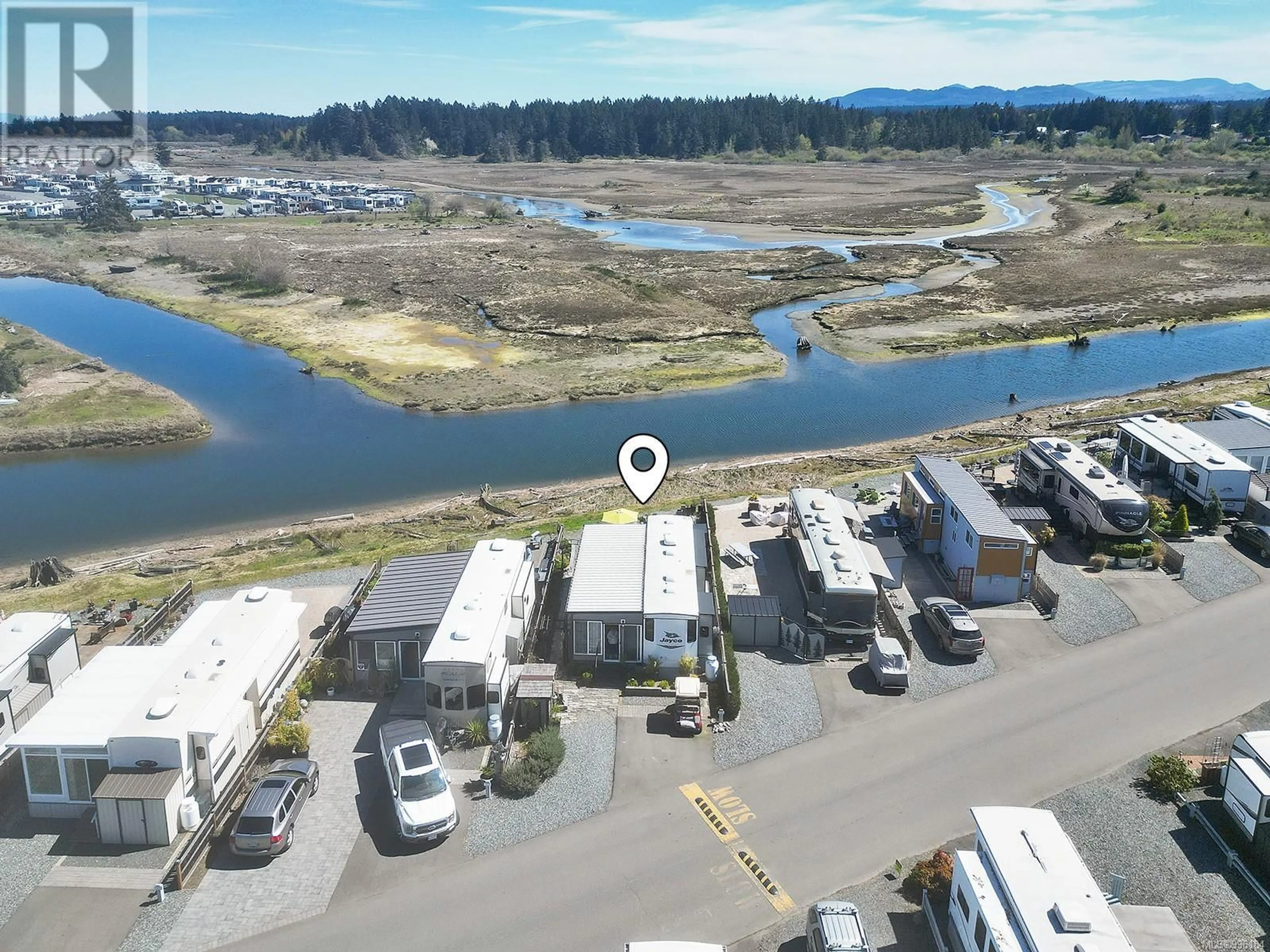 A pic from outside/outdoor area/front of a property/back of a property/a pic from drone, water/lake/river/ocean view for 416 - 200 CORFIELD STREET, Parksville British Columbia V9P2G7