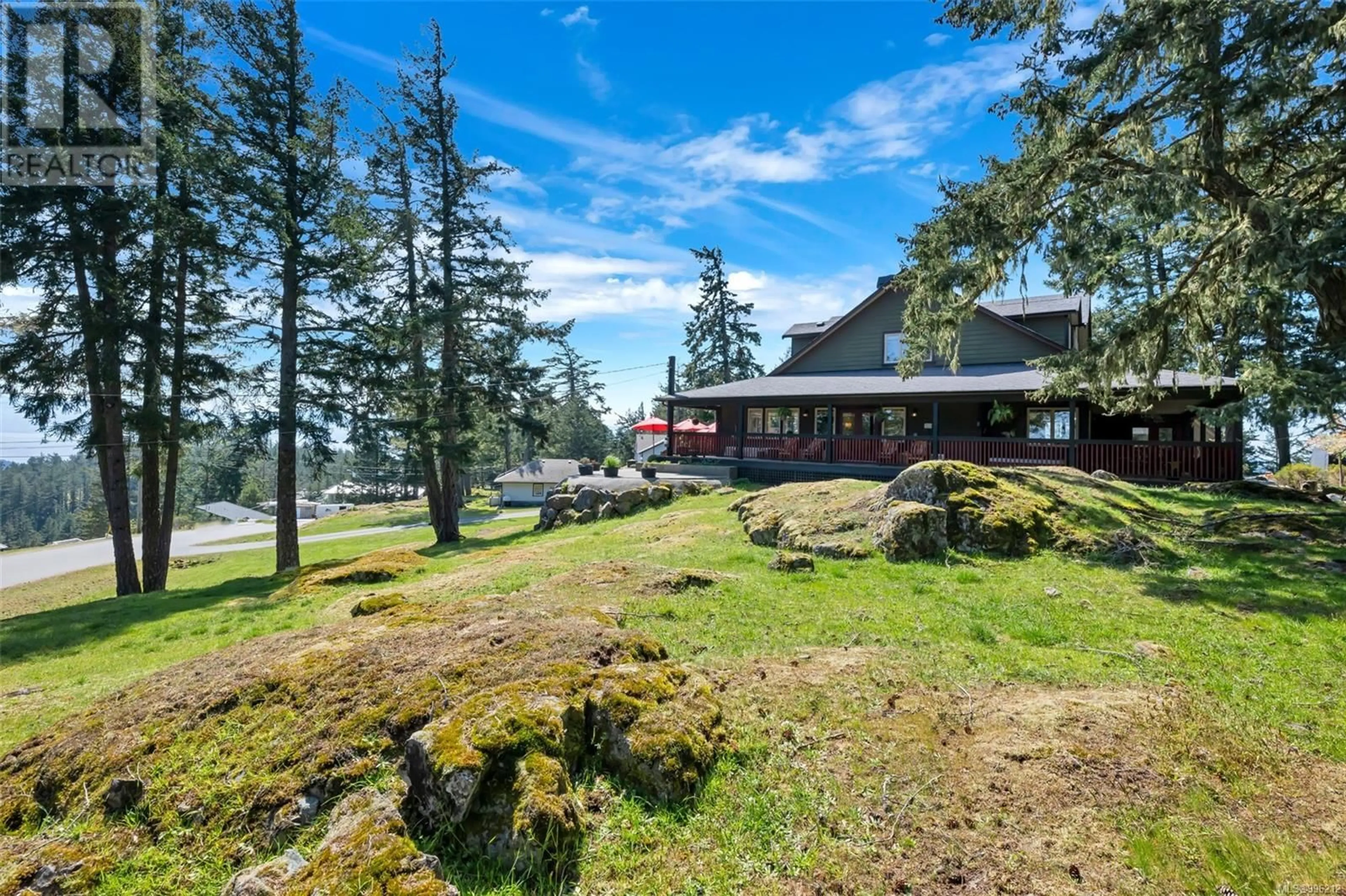 A pic from outside/outdoor area/front of a property/back of a property/a pic from drone, water/lake/river/ocean view for 700 CAINS WAY, Sooke British Columbia V9Z1C5