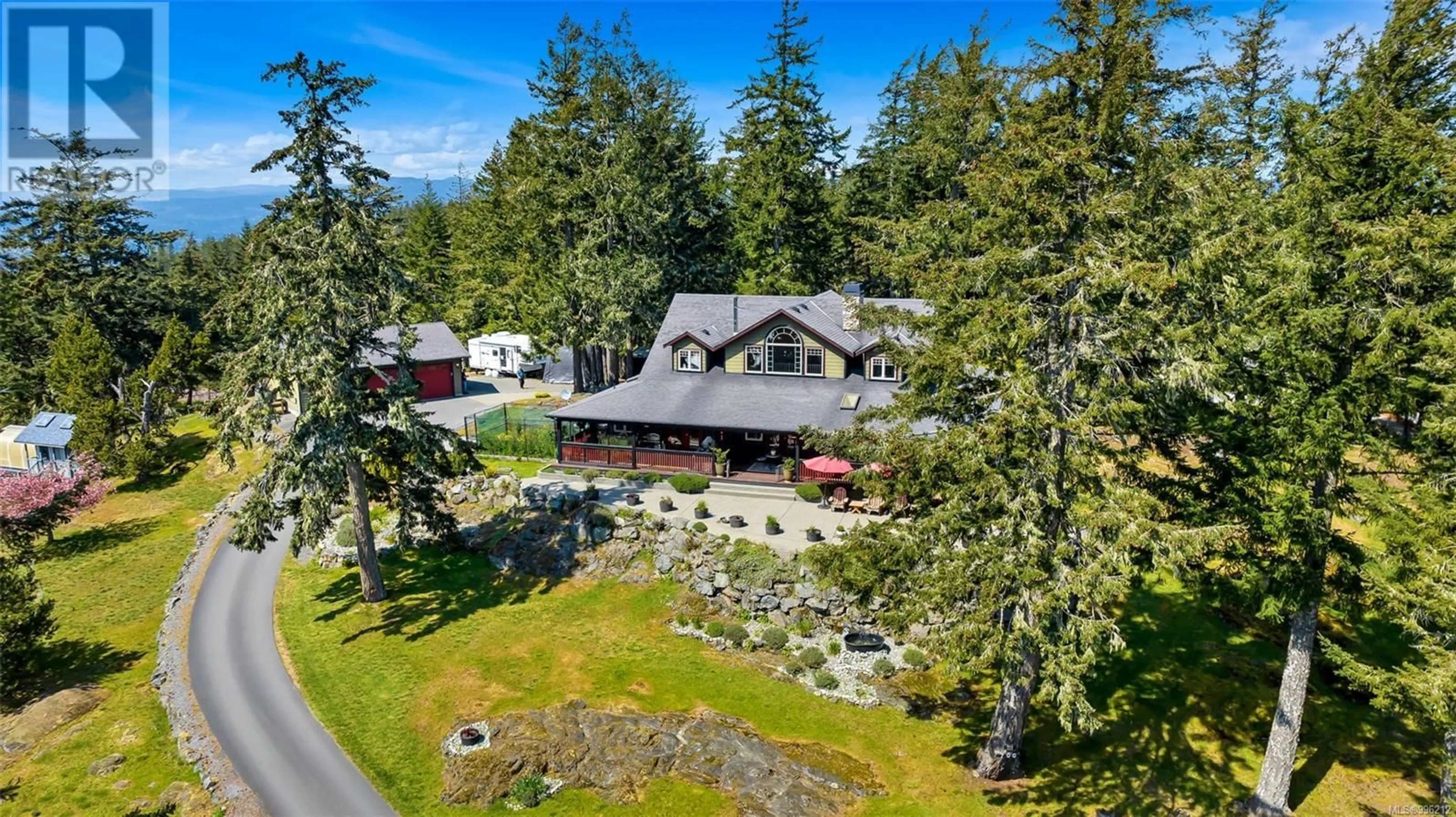 A pic from outside/outdoor area/front of a property/back of a property/a pic from drone, unknown for 700 CAINS WAY, Sooke British Columbia V9Z1C5