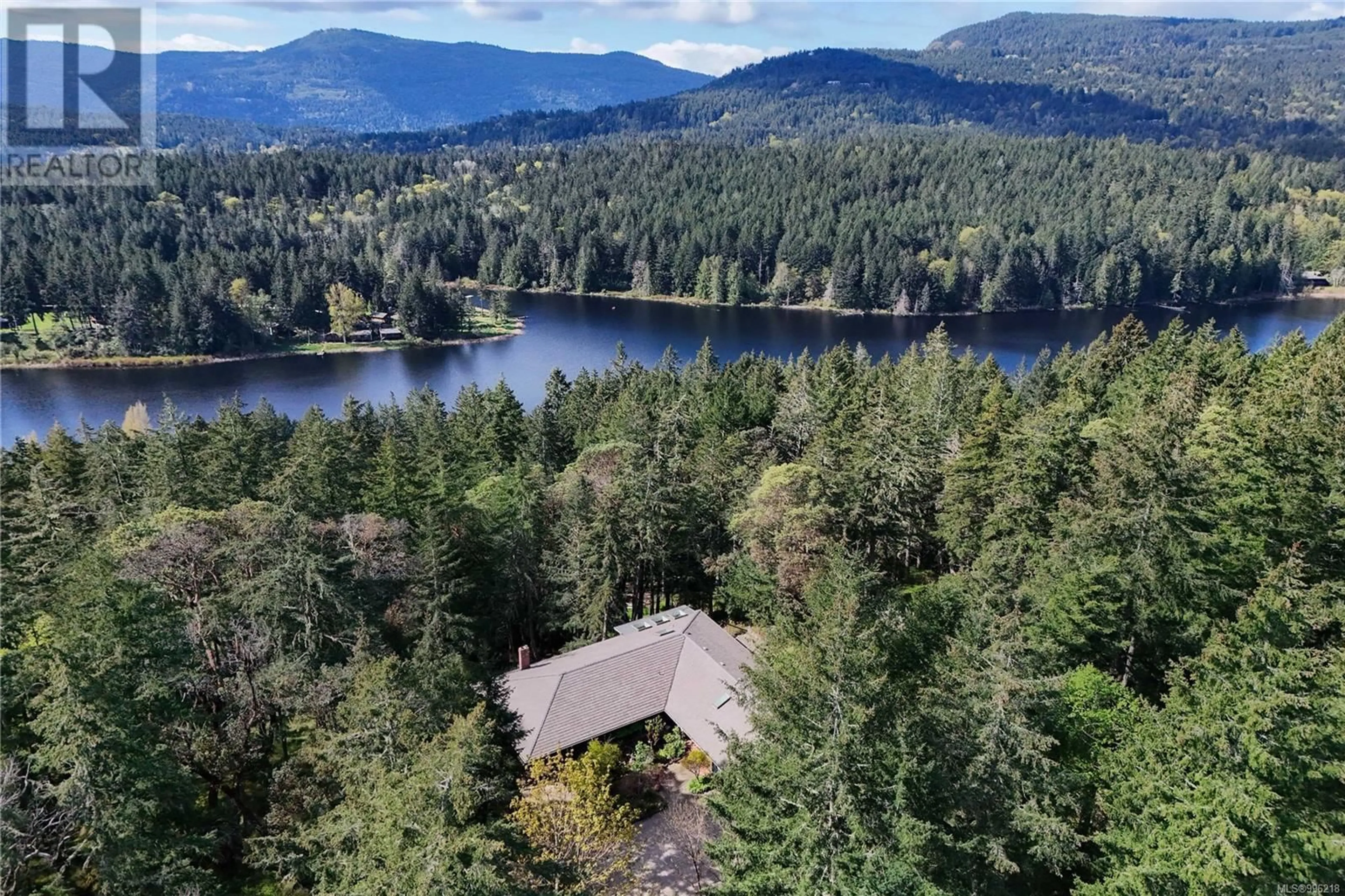 A pic from outside/outdoor area/front of a property/back of a property/a pic from drone, water/lake/river/ocean view for 332 SKY VALLEY ROAD, Salt Spring British Columbia V8K2C3
