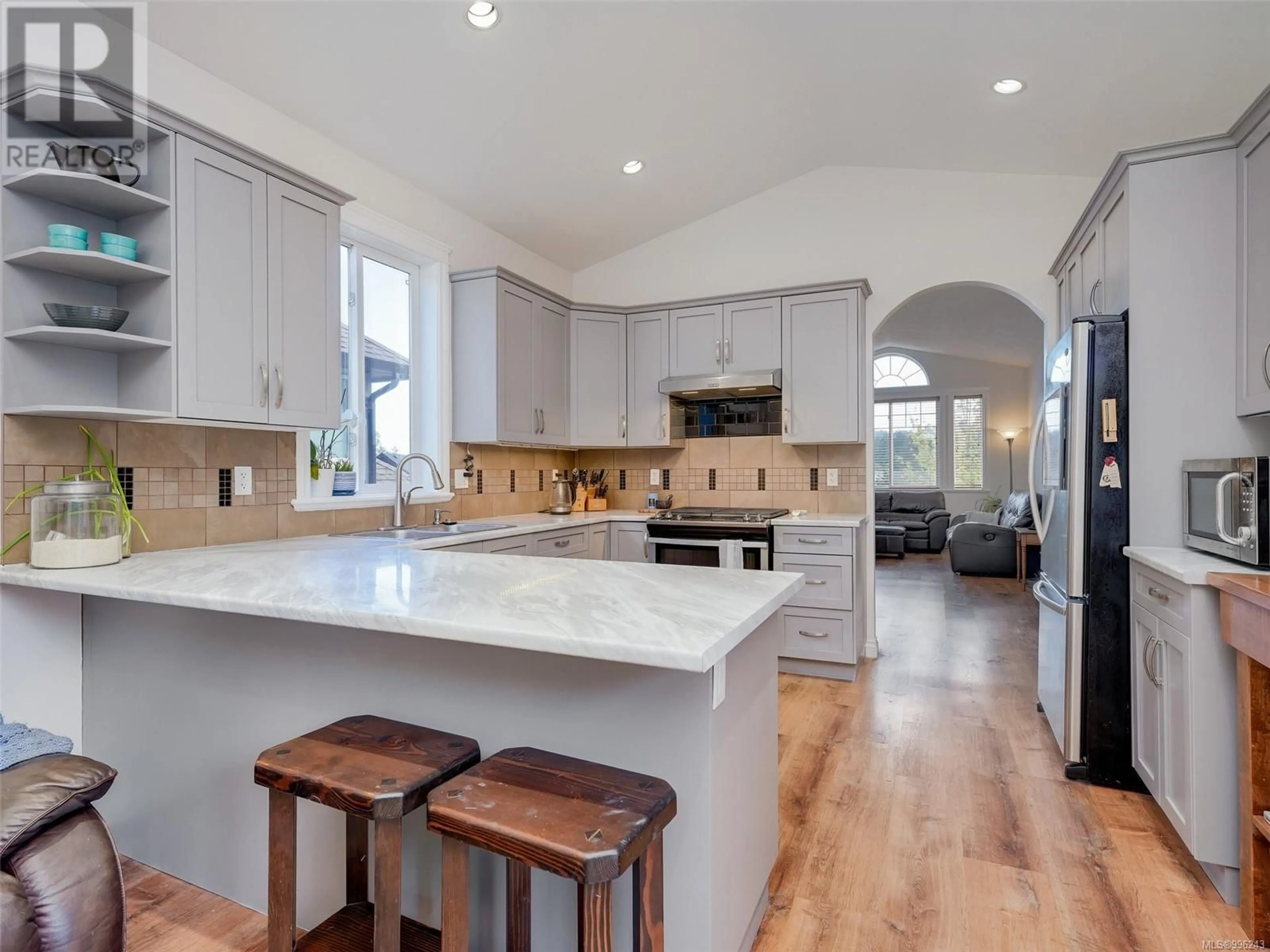Open concept kitchen, ceramic/tile floor for 3718 RIDGE POND DRIVE, Langford British Columbia V9C4M8