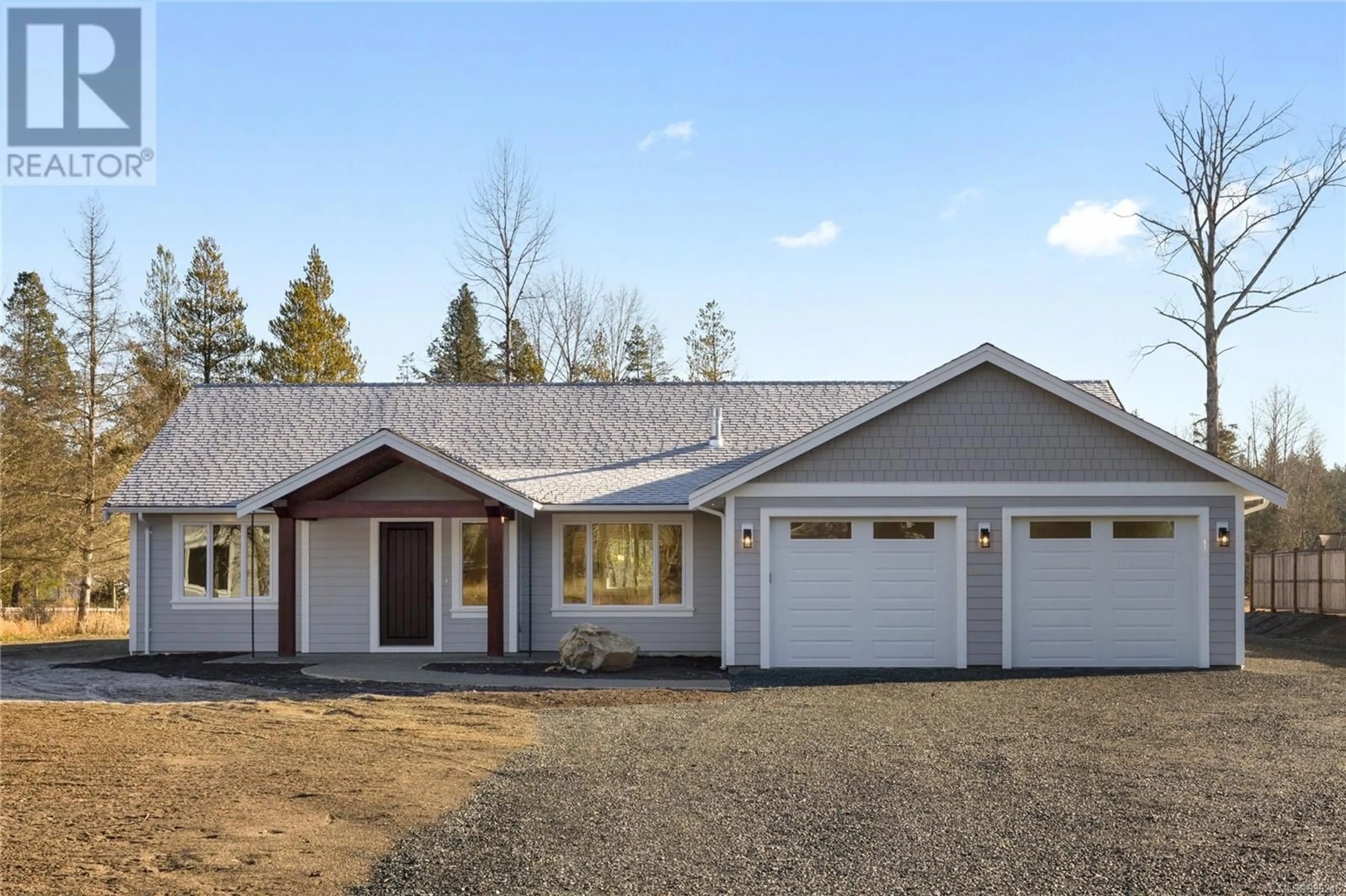 Home with vinyl exterior material, street for STATION ROAD, Coombs British Columbia V0R1M0